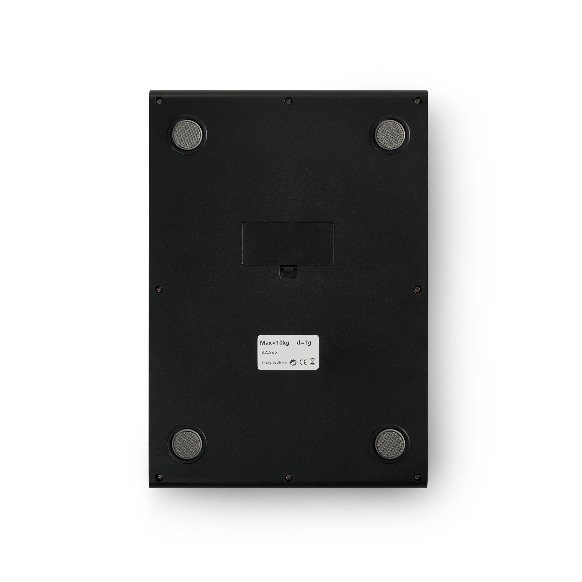 Die Unterseite einer schwarzen Waage mit vier Gummifüßen und einem Batteriefach.