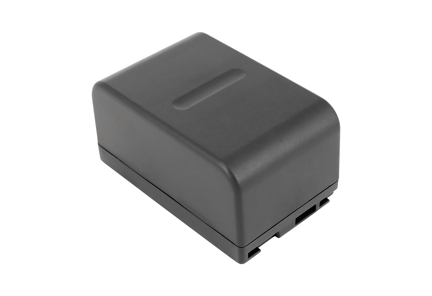 Eine graue Batterie mit abgerundeten Ecken und einer erhabenen Linie auf der Oberseite.