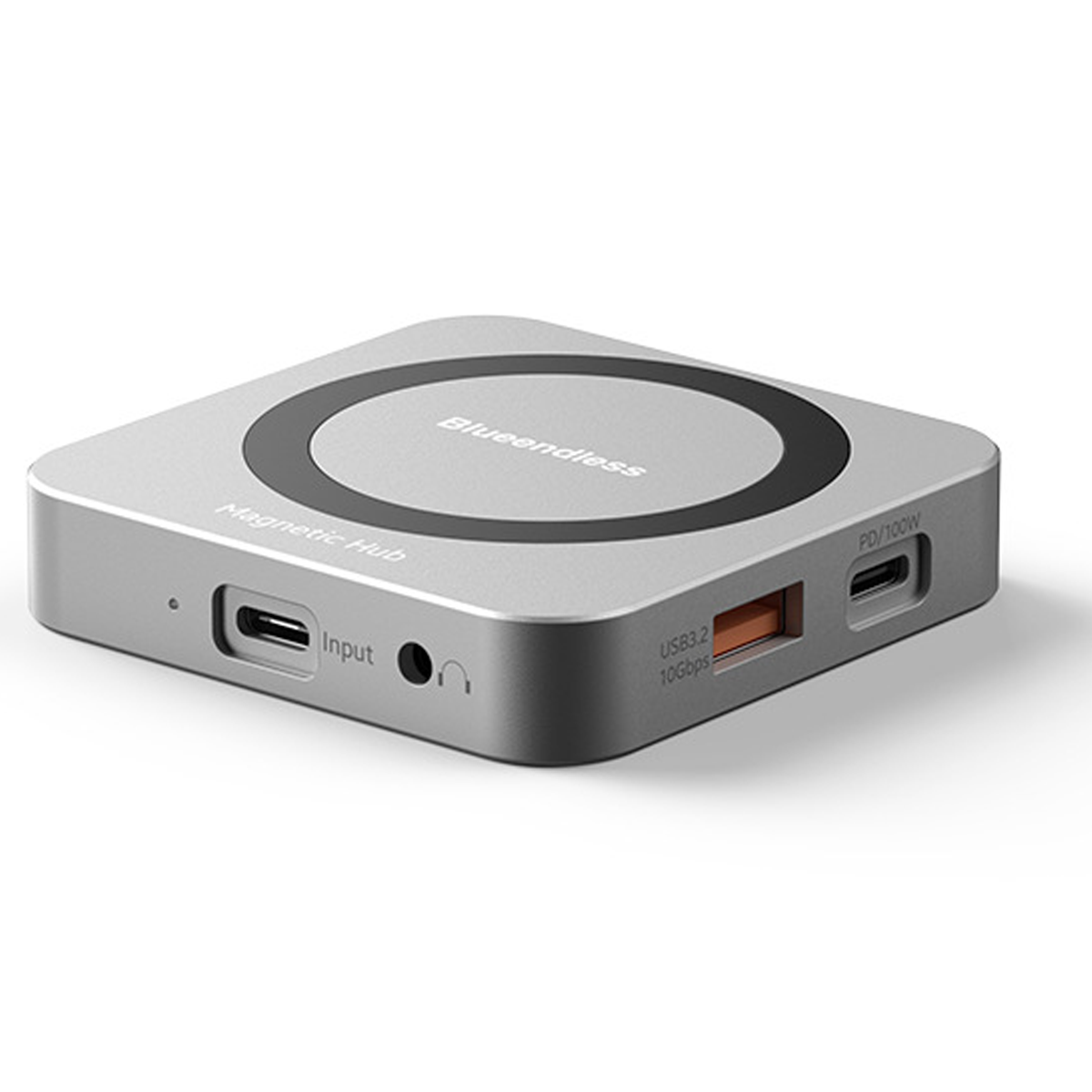 Silberner magnetischer Hub mit USB-C-Eingang, USB-A und USB-C-Anschlüssen.