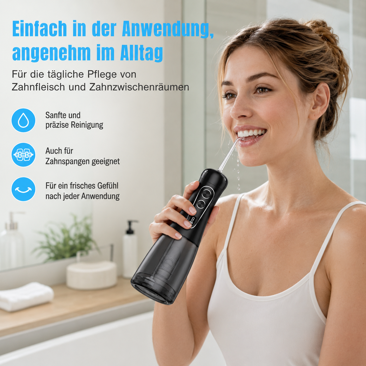 Frau benutzt einen schwarzen Mundhygiene-Sprühgerät in einem Badezimmer.