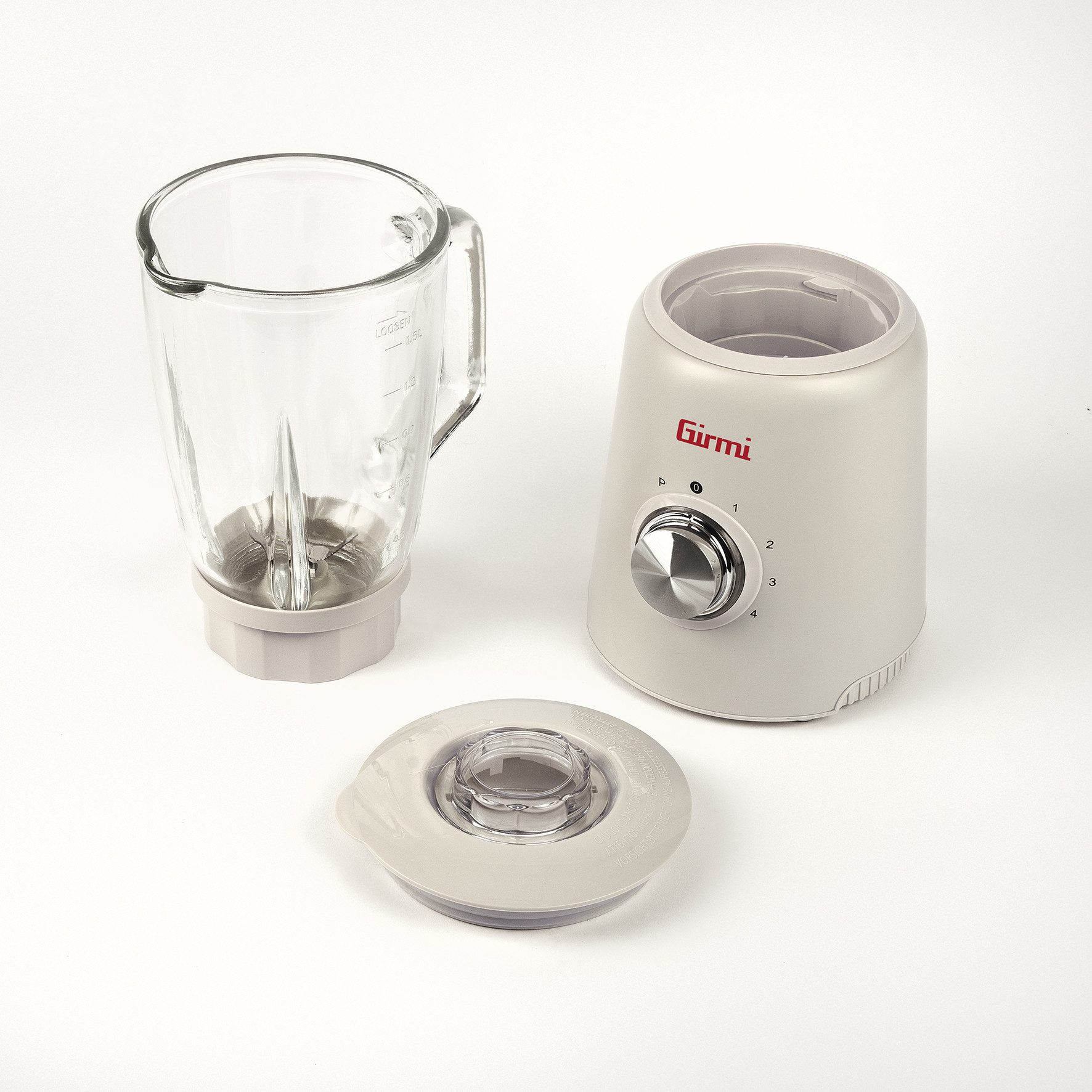Ein weißer Mixer mit Glaskrug, Deckel und Basis mit Drehknopf.