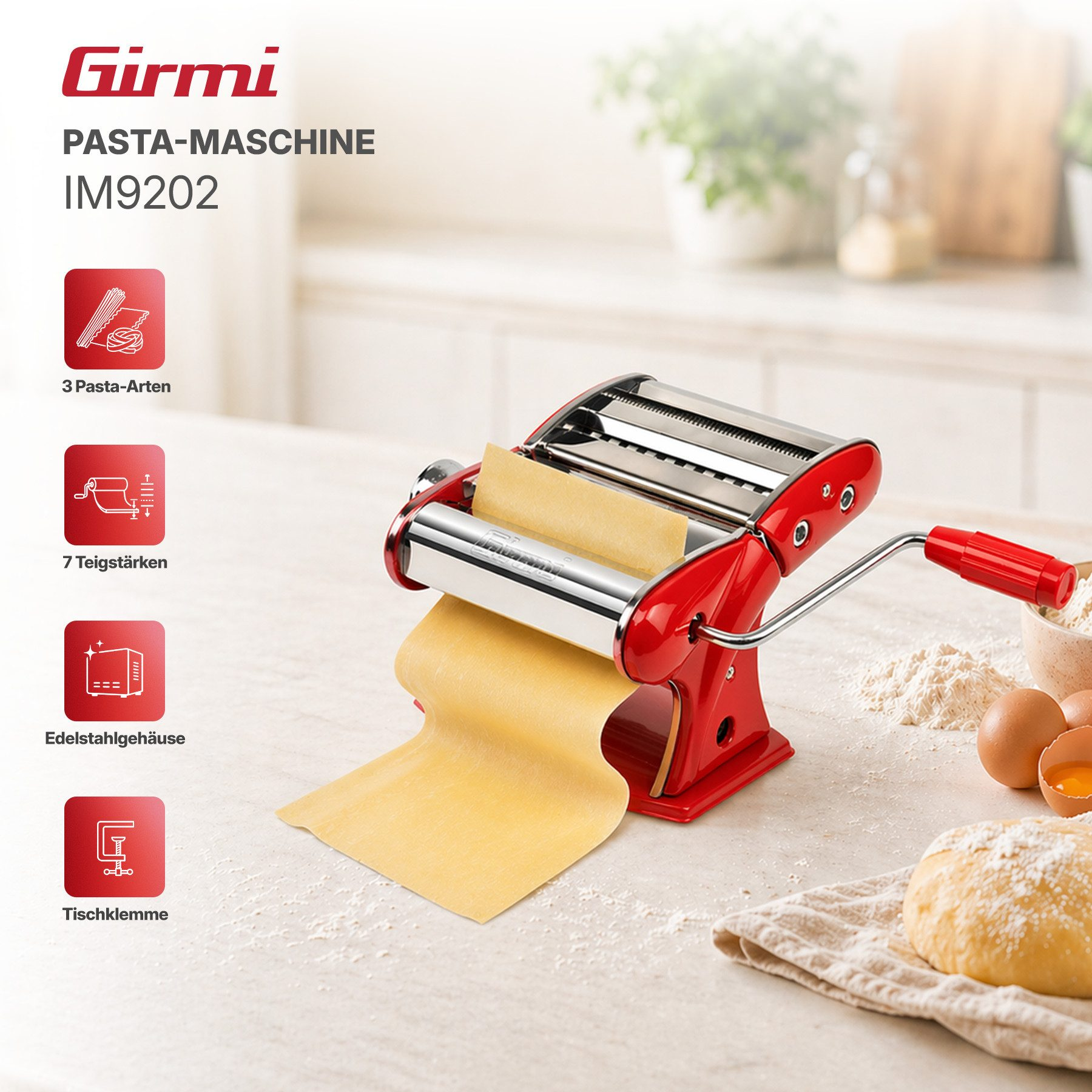 Rote Girmi Nudelmaschine IM9202 mit Teig und Eiern auf einem Tisch.