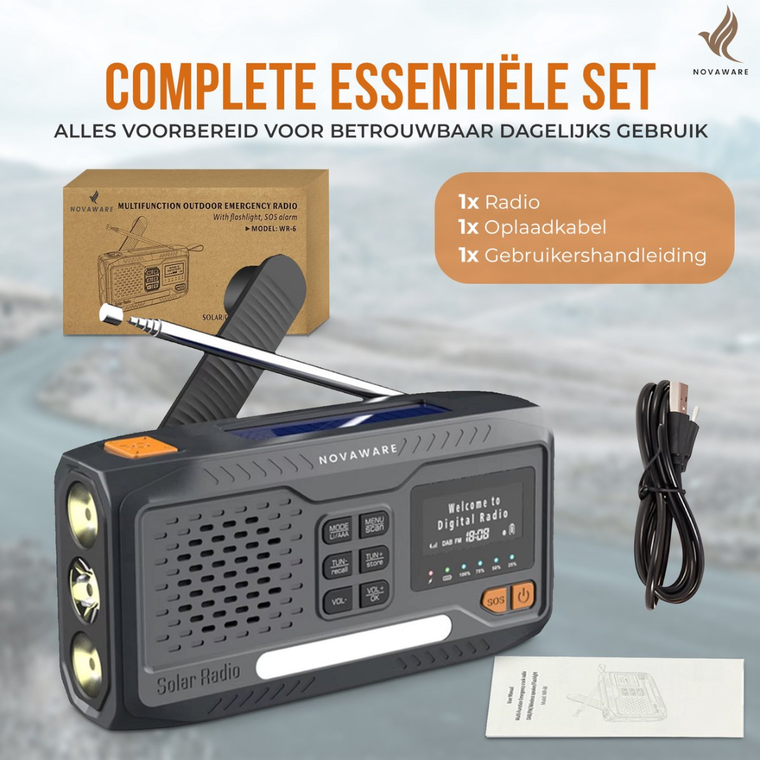 A gray emergency radio with flashlight, charging cable, and manual.