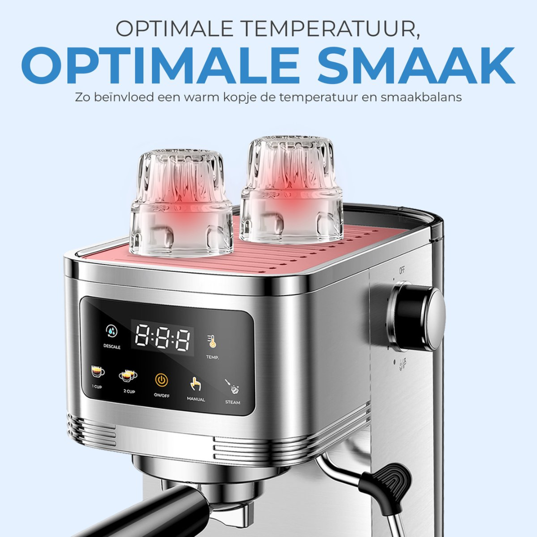 A silver espresso machine with two glasses on top, illuminated from below.