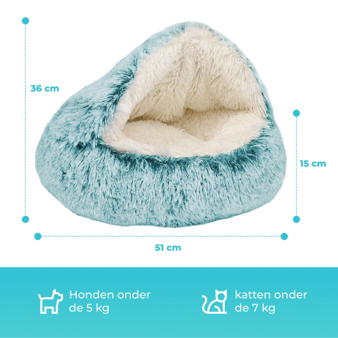 A fluffy, teal and white pet bed with dimensions 51x36x15 cm.