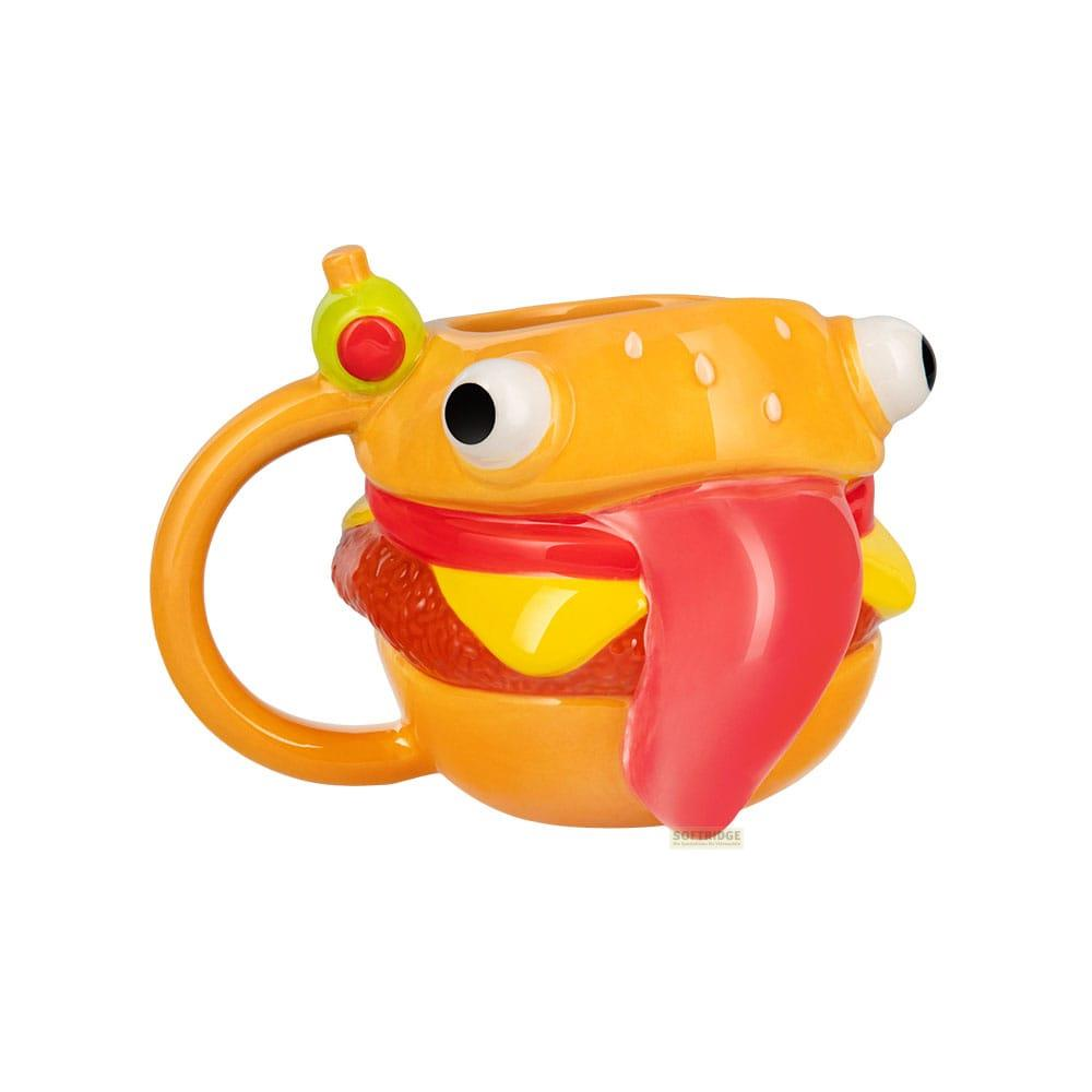 Una taza de hamburguesa con boca roja, lengua y ojos.