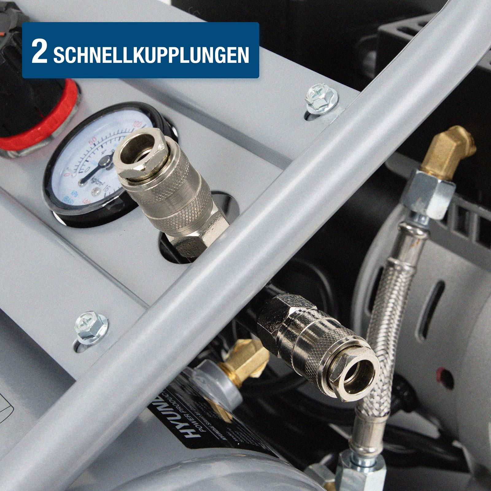 Nahaufnahme von zwei Schnellkupplungen und einem Manometer an einem Kompressor.