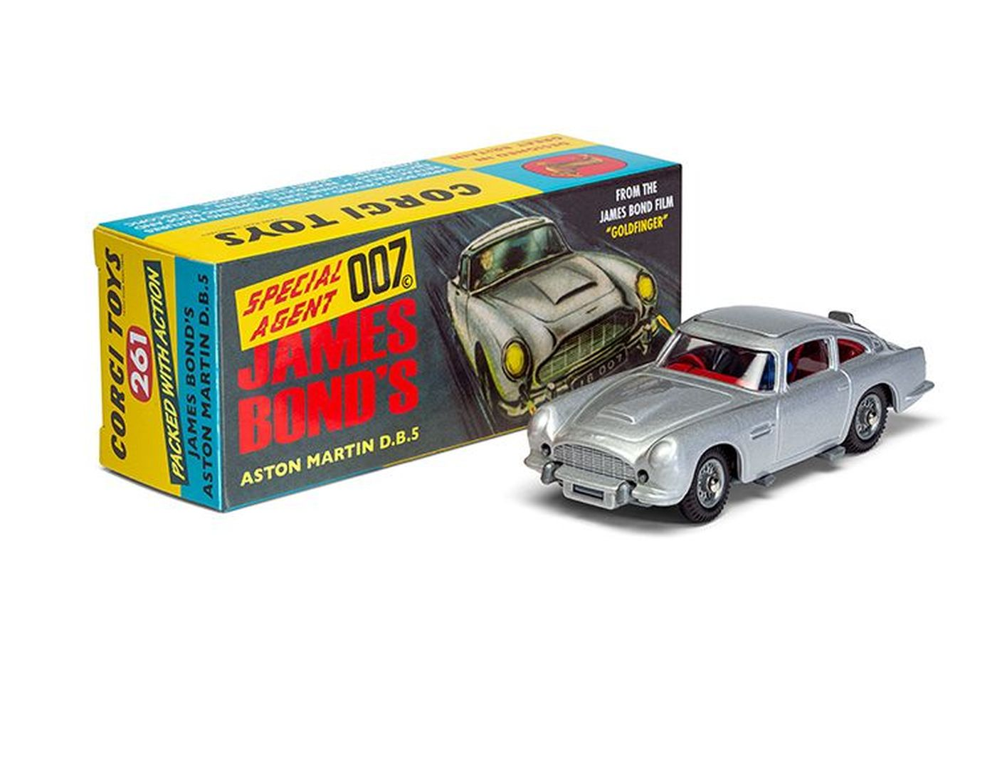 Srebrny samochodzik James Bond Aston Martin DB5 obok oryginalnego pudełka.