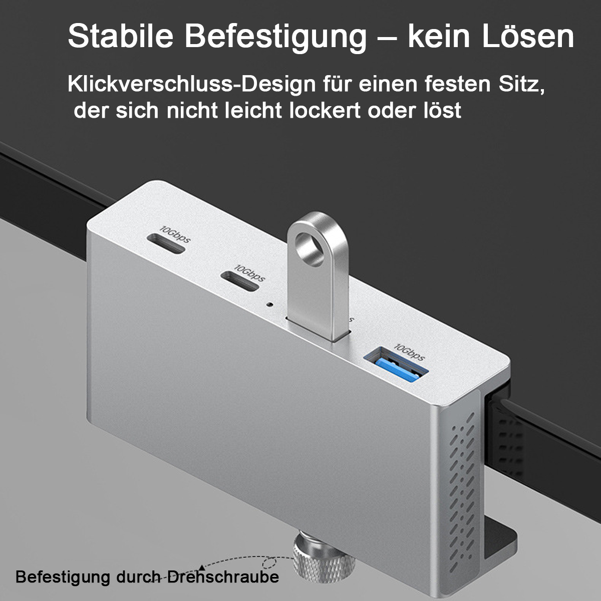 Silberner USB-C-Hub mit 10Gbps Anschlüssen, befestigt an einem Bildschirm.