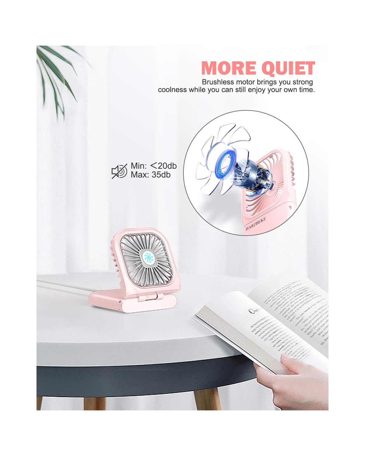 Pinker tragbarer Ventilator auf einem Tisch neben einem offenen Buch. Text betont leisen Betrieb.