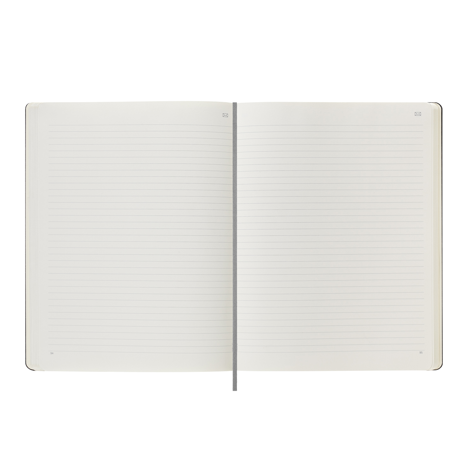 Un taccuino aperto con pagine a righe e un segnalibro grigio.