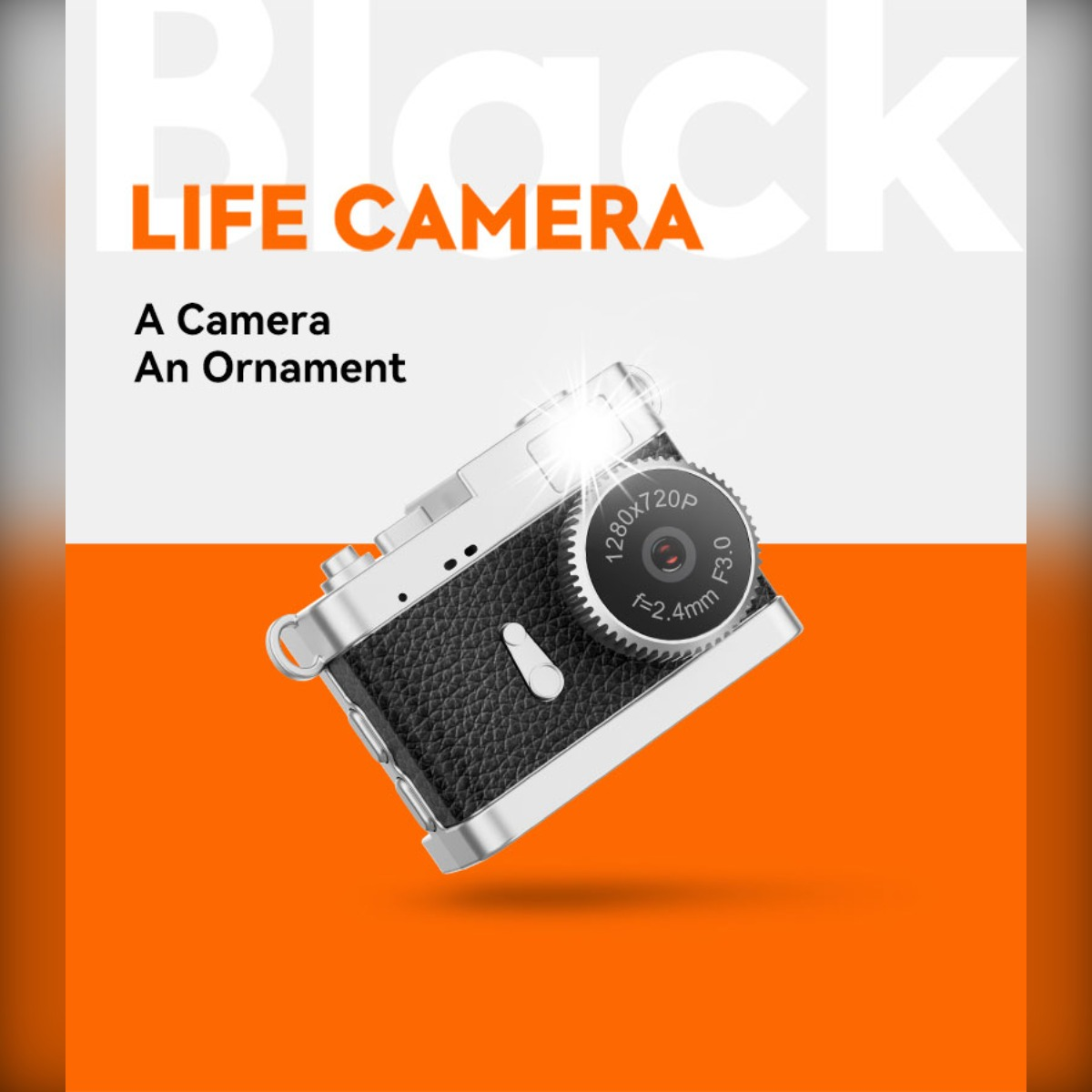 Eine silberne und schwarze Vintage-Kamera mit Text 'LIFE CAMERA' und 'A Camera An Ornament'.