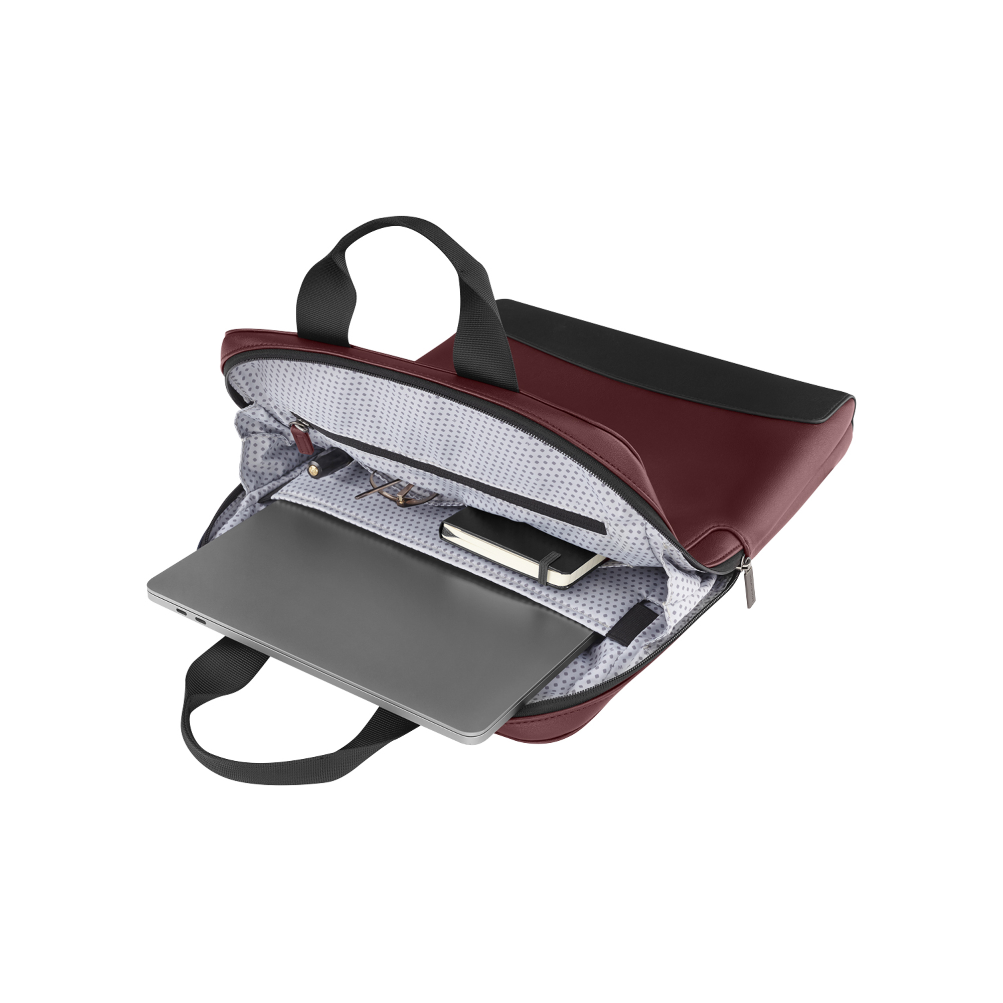 Borsa porta computer bordeaux con manici neri, laptop, taccuino e occhiali.