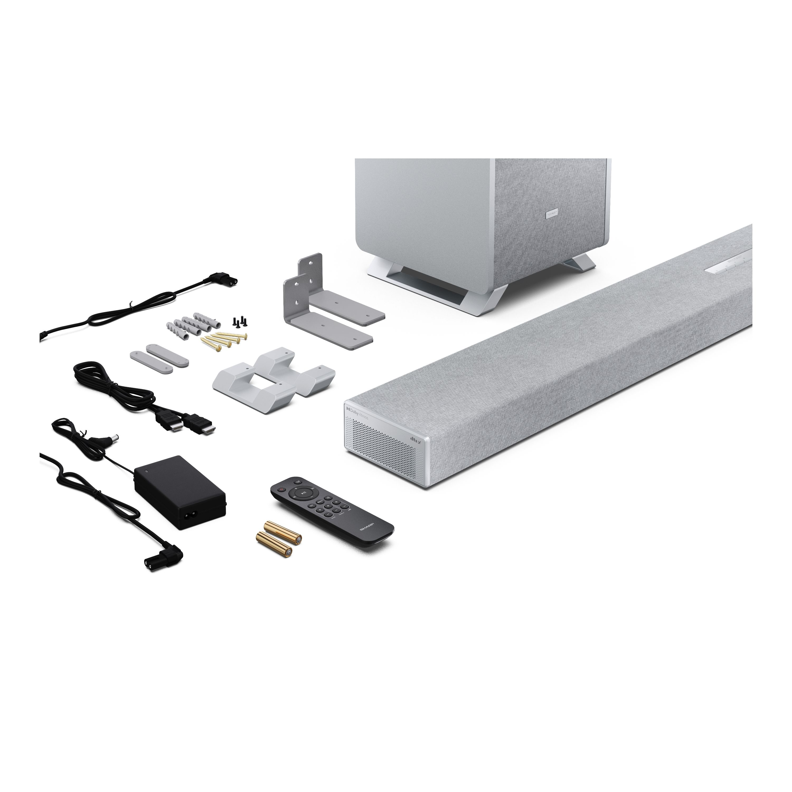 Ein Soundbar-System mit Subwoofer, Fernbedienung, Batterien, Kabeln und Halterungen.