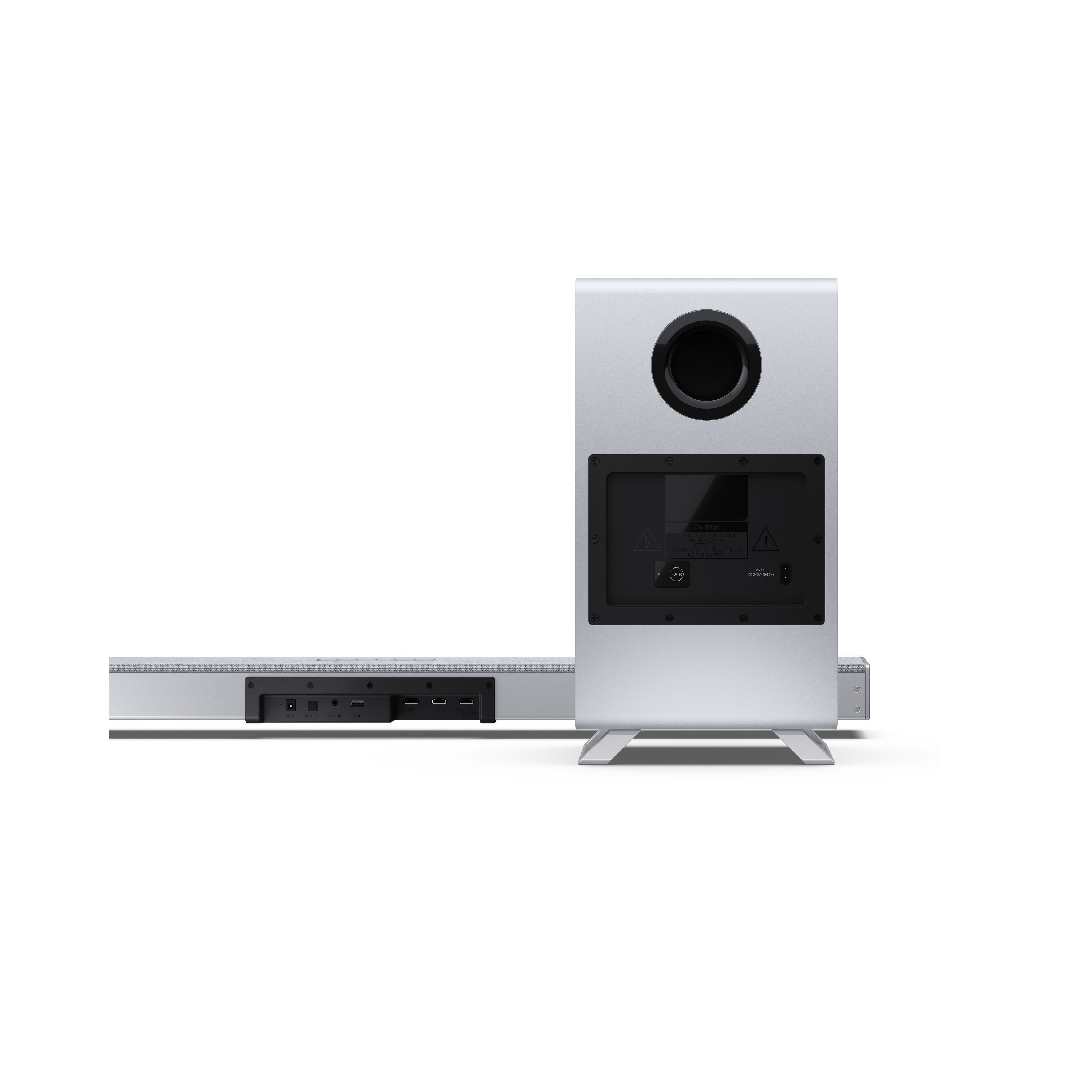 Silberne Soundbar und Subwoofer mit Anschlüssen und Warnhinweisen.
