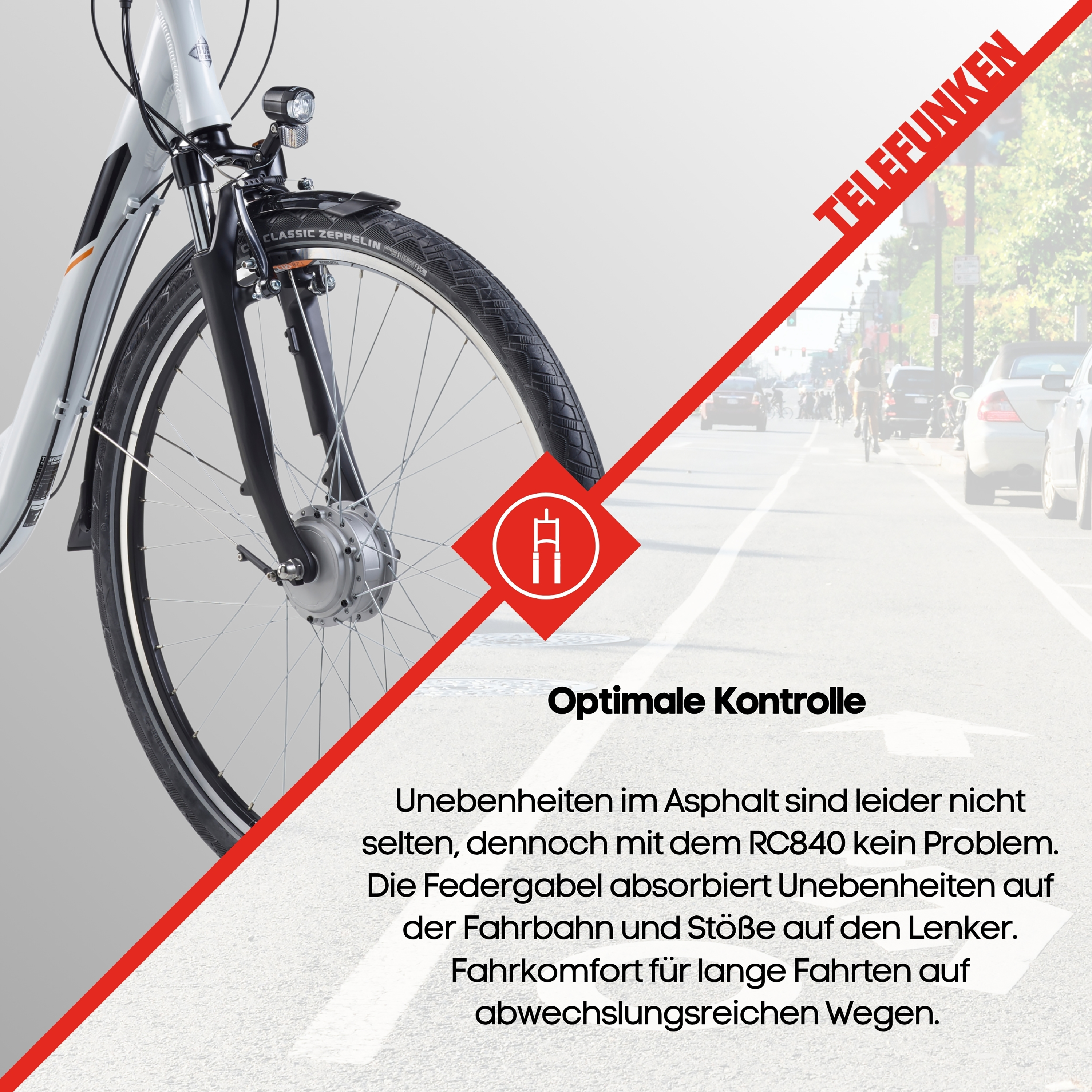 Nahaufnahme eines weißen Fahrrads mit Federgabel, Vorderrad und Scheinwerfer.