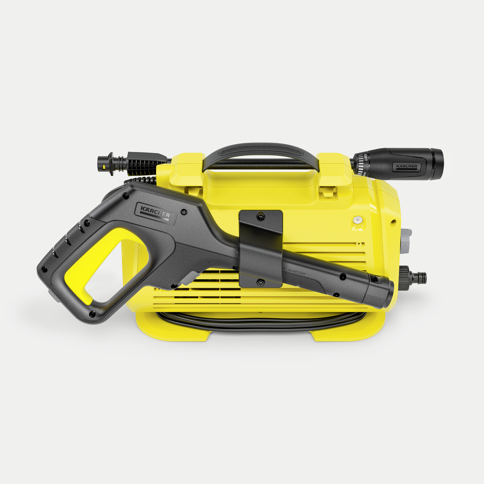 Yellow pressure washer with black gun and hose on a grey background.