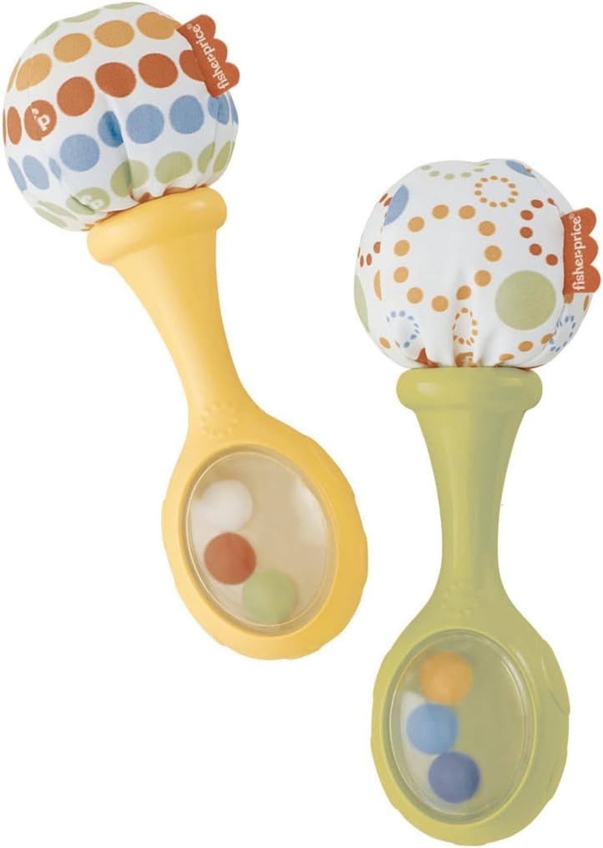Zwei Fisher-Price-Rasseln mit bunten Punkten und Kugeln im Inneren.