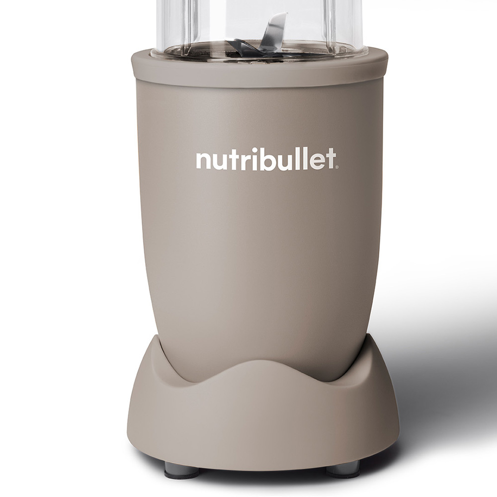 A gray Nutribullet blender with a clear top and blades.