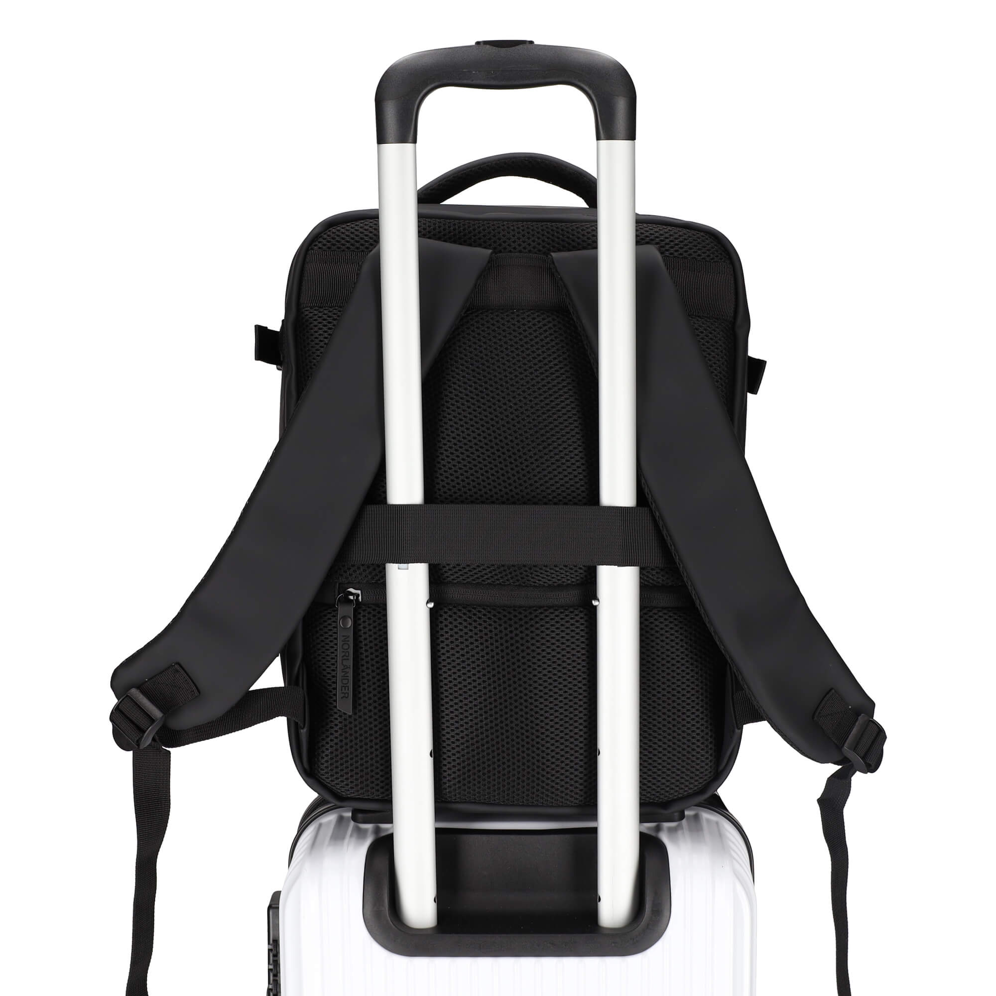 Back view of a black backpack on a white rolling suitcase.