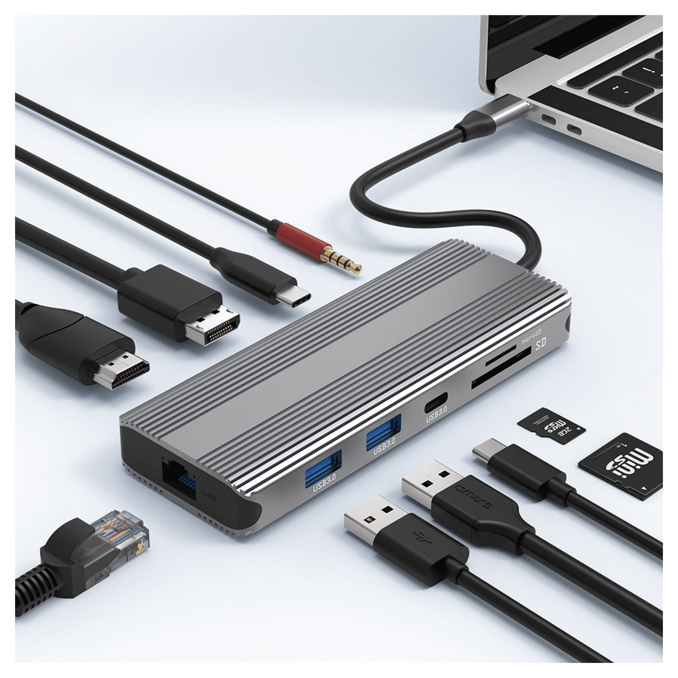 A silver USB-C hub with ports and cables, connected to a laptop.