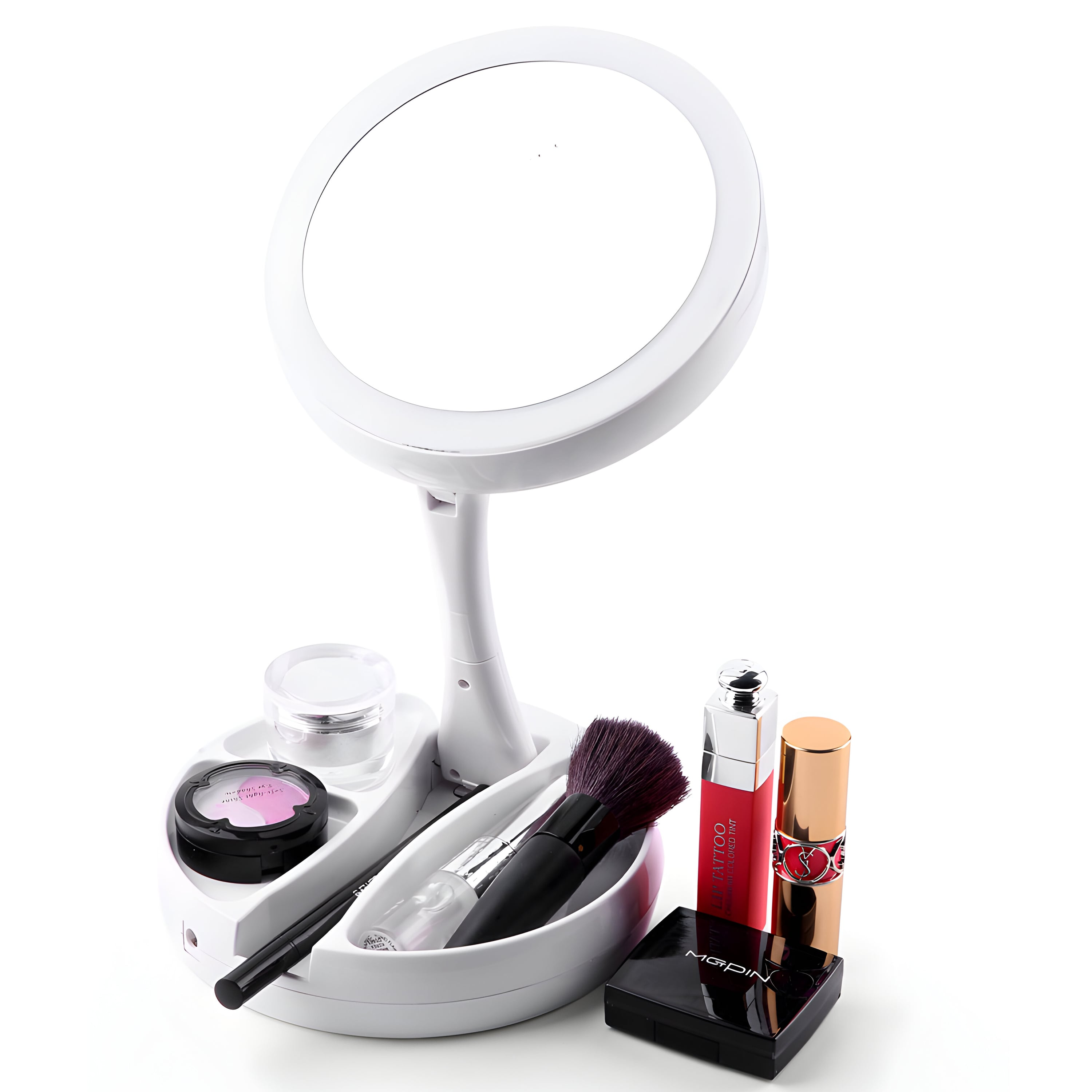 Uno specchio per il trucco illuminato con rossetto, cipria e pennello.