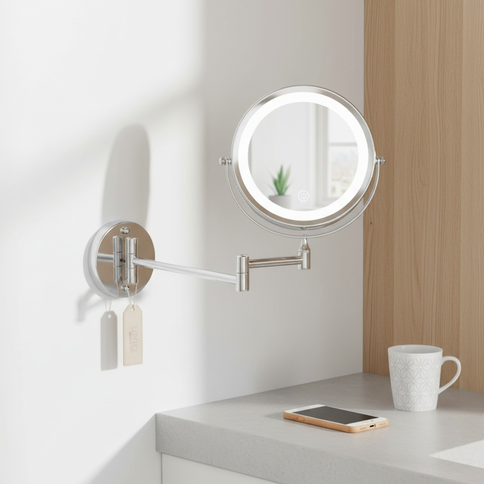 Uno specchio da toeletta estensibile a parete con illuminazione a LED.