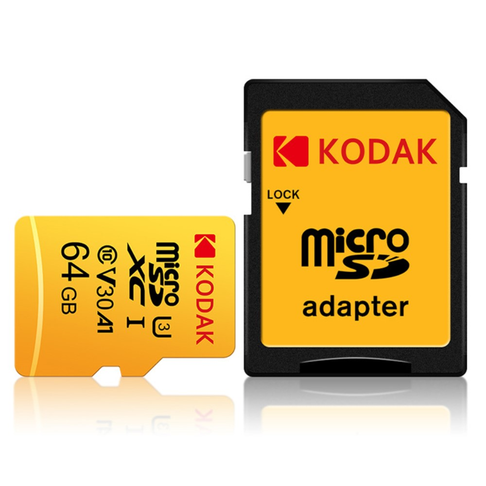Une carte mémoire microSD jaune de 64 Go et un adaptateur noir avec étiquette jaune.