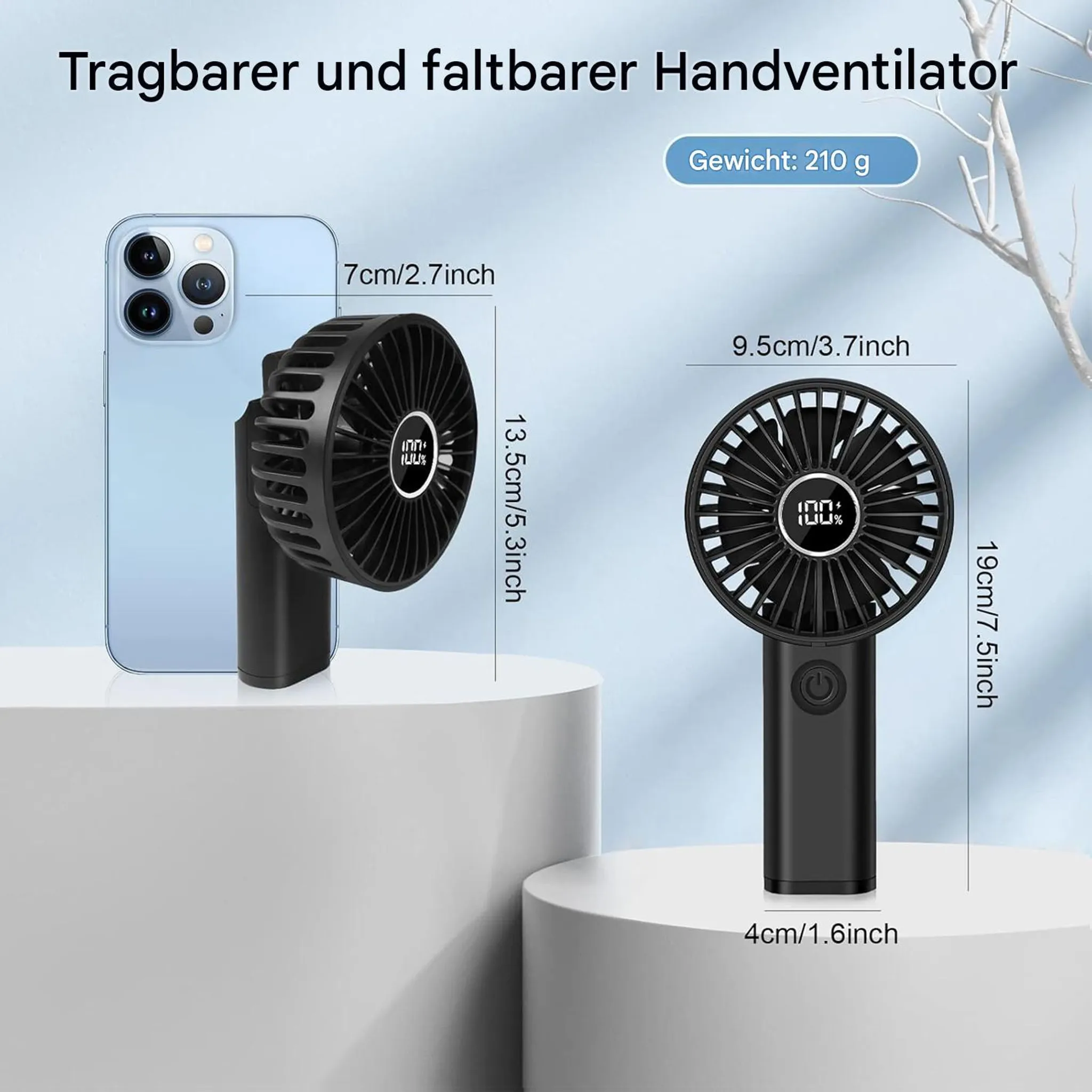 Schwarzer Handventilator mit digitaler Anzeige, daneben ein Smartphone.