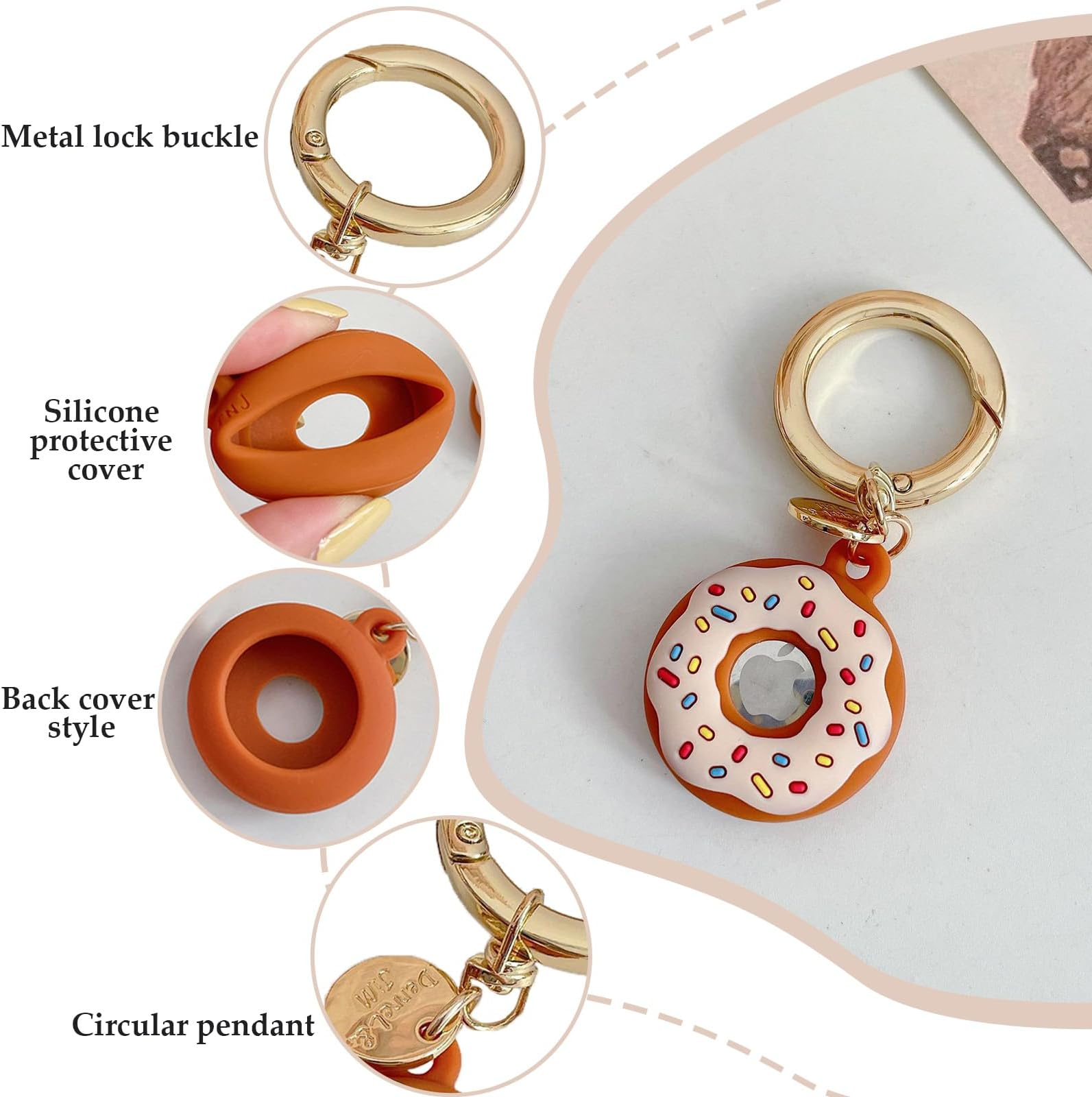 Ein Schlüsselanhänger in Donut-Form mit goldenem Verschluss und Silikonhülle.