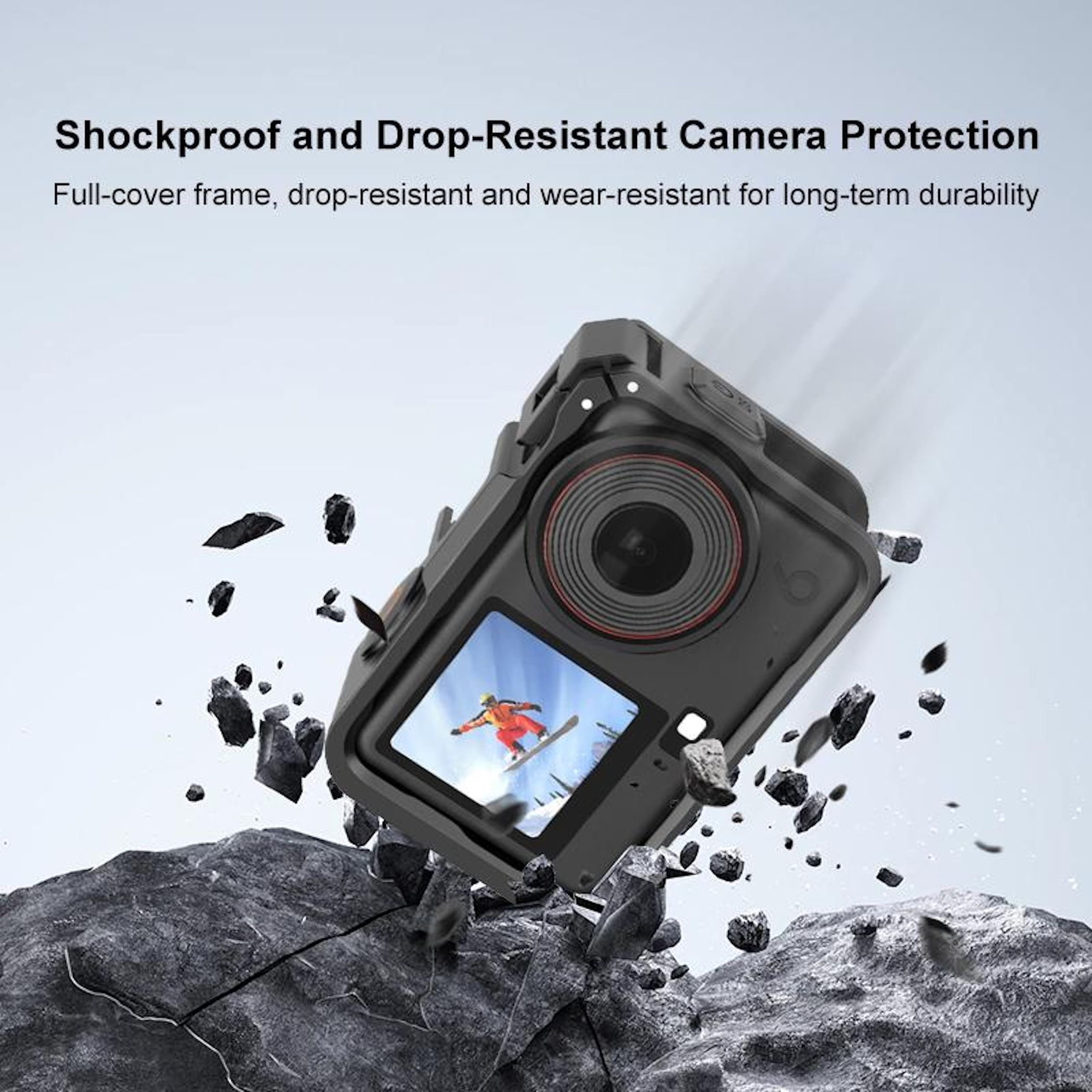 Custodia nera per fotocamera con sciatore sullo schermo, circondata da rocce volanti.
