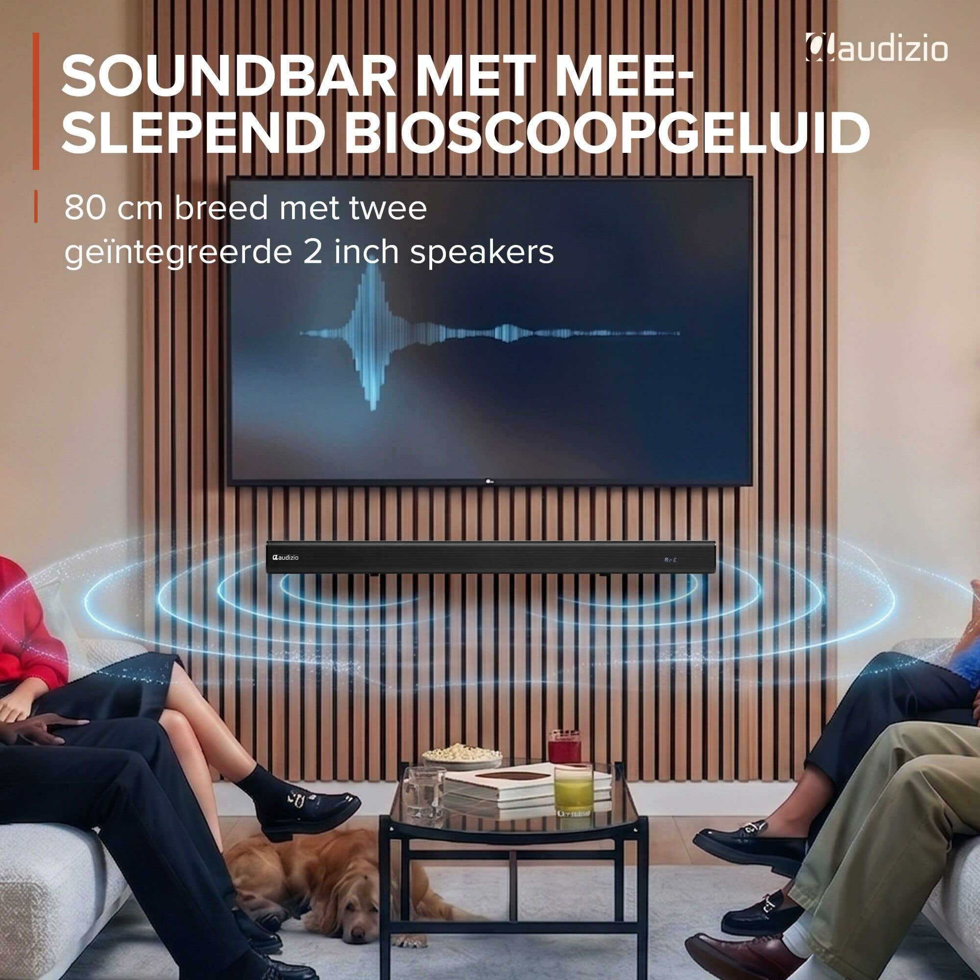 Barra de sonido frente a una pantalla con visualización de forma de onda, gente sentada.