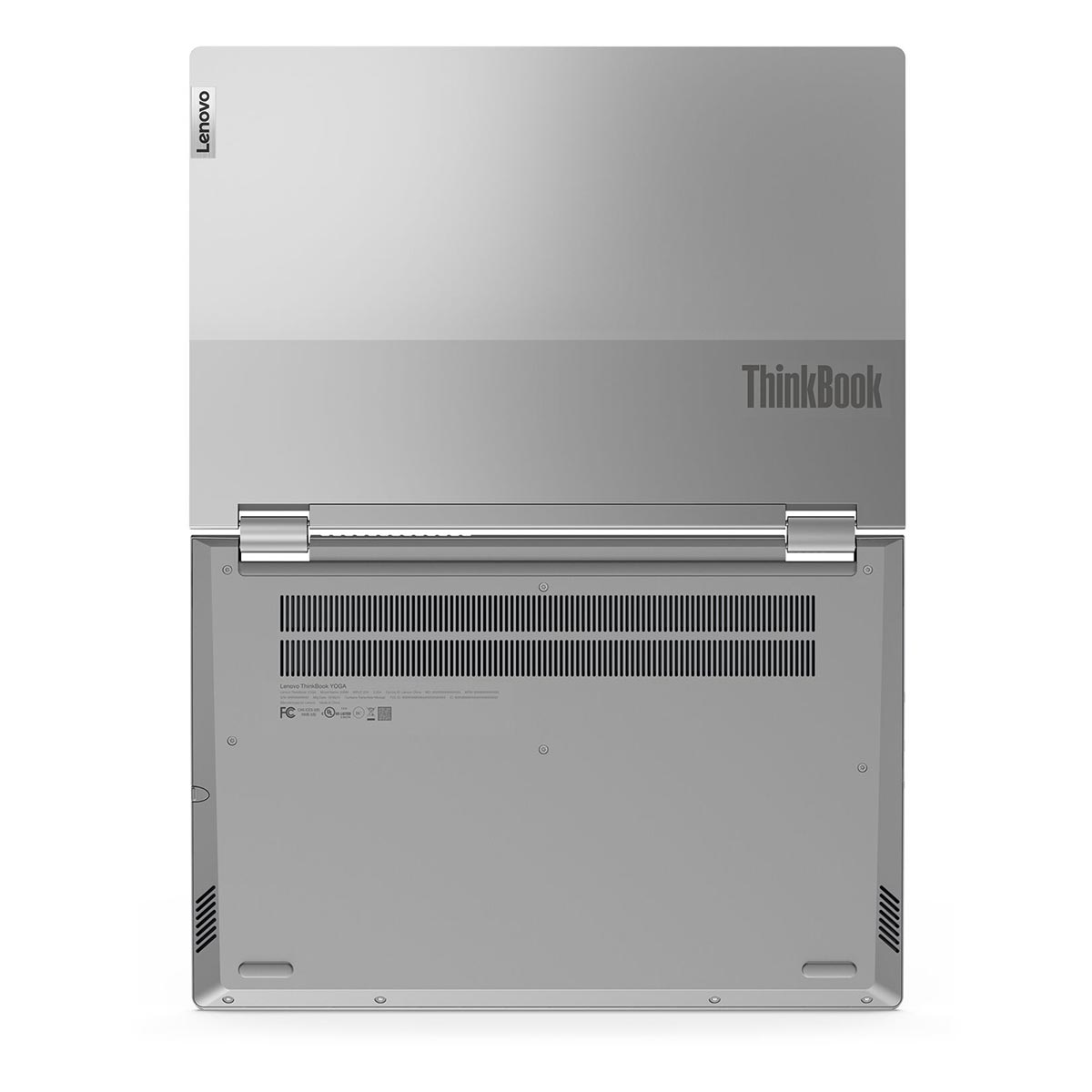 Srebrny laptop Lenovo z logo ThinkBook, spód z otworami wentylacyjnymi.