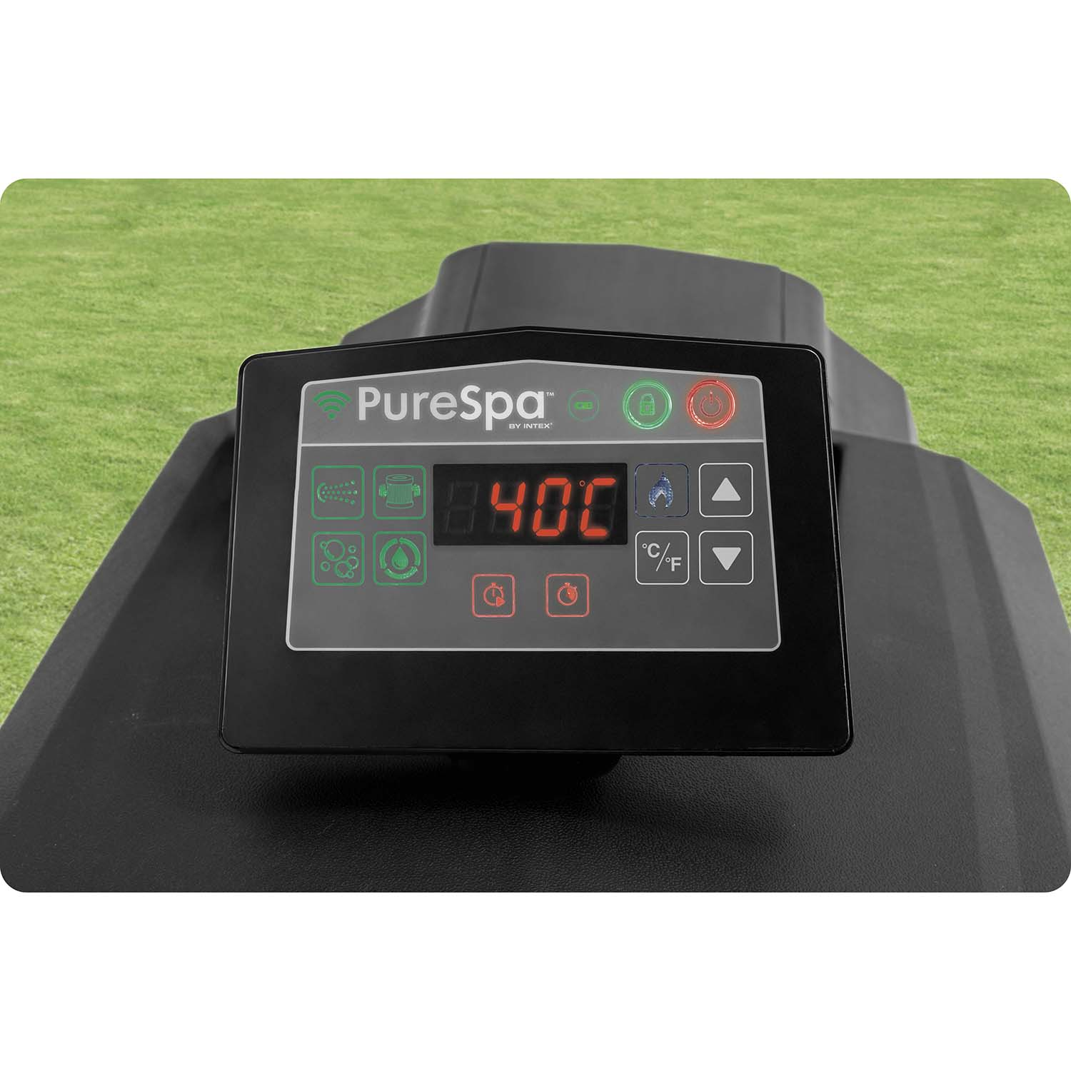 Ein schwarzes Bedienfeld mit digitaler Temperaturanzeige 40C auf einem Rasen.