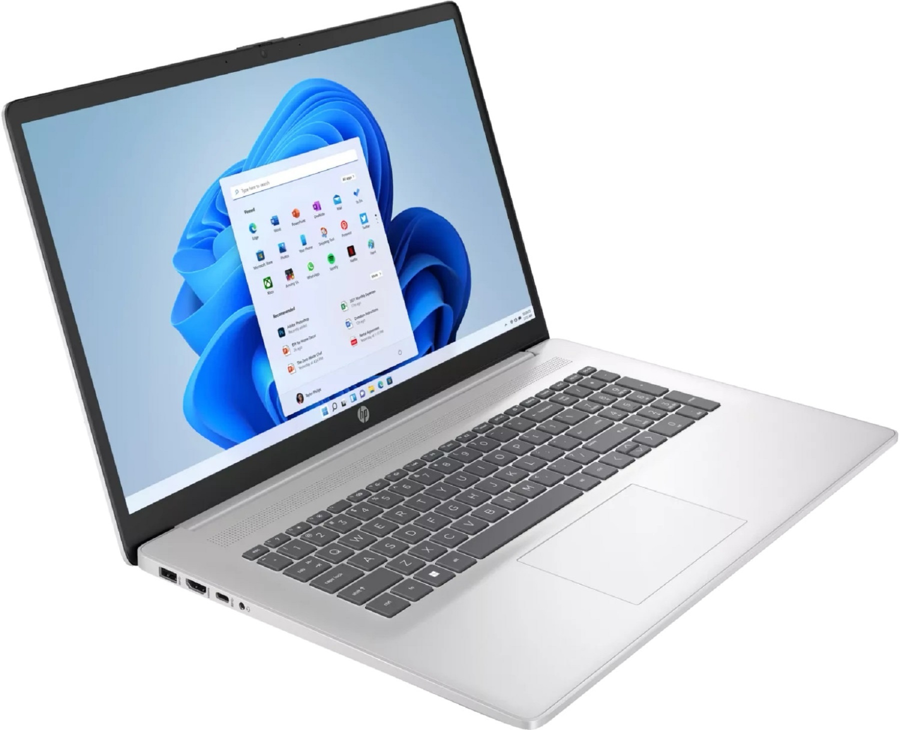 Ein silberner Laptop mit Windows 11 und einem blauen Hintergrundbild.