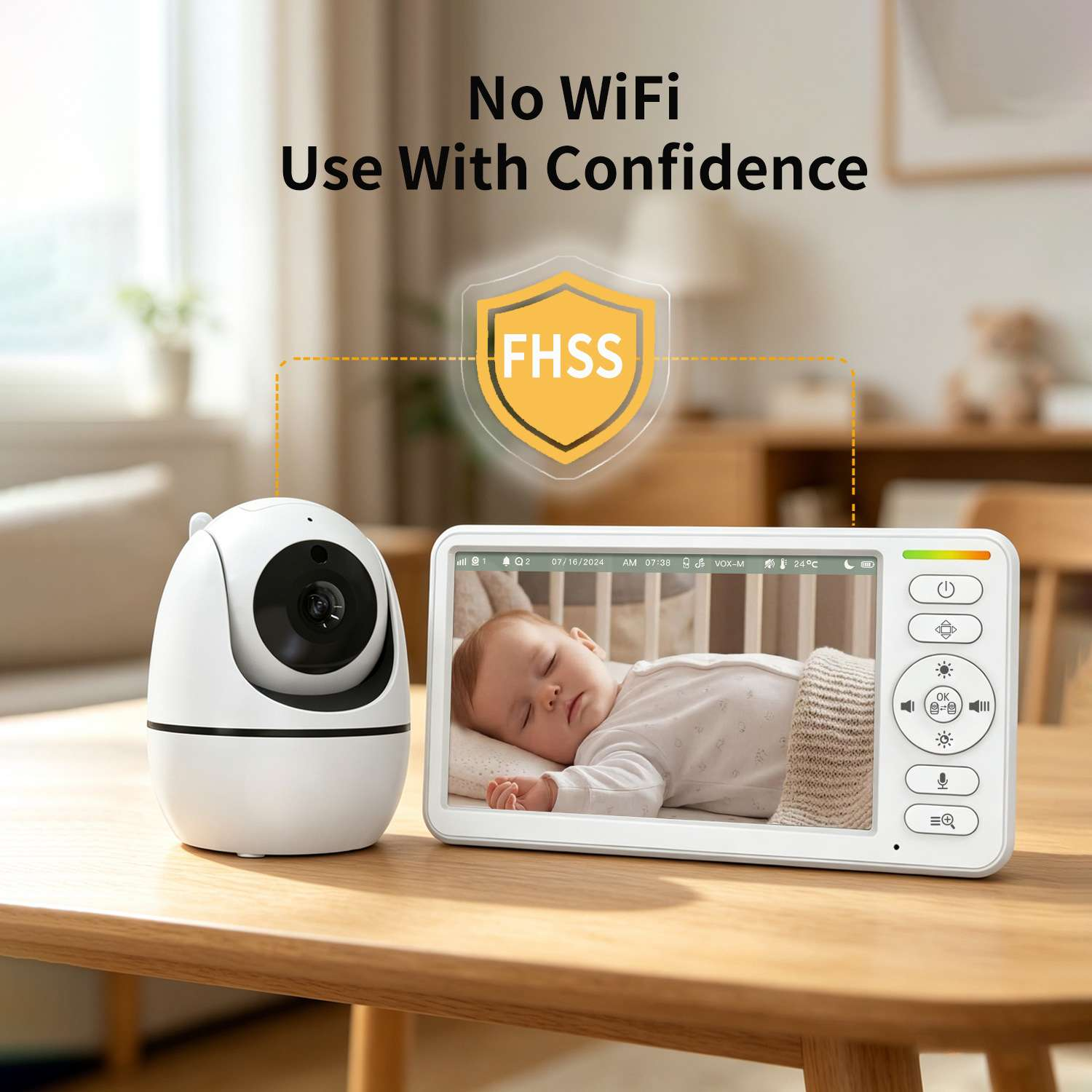 Ein weißes Babyphone mit Kamera und Monitor zeigt ein schlafendes Baby.