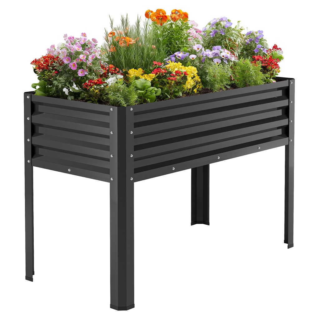 Ein rechteckiges Hochbeet aus schwarzem Metall mit bunten Blumen und Pflanzen.