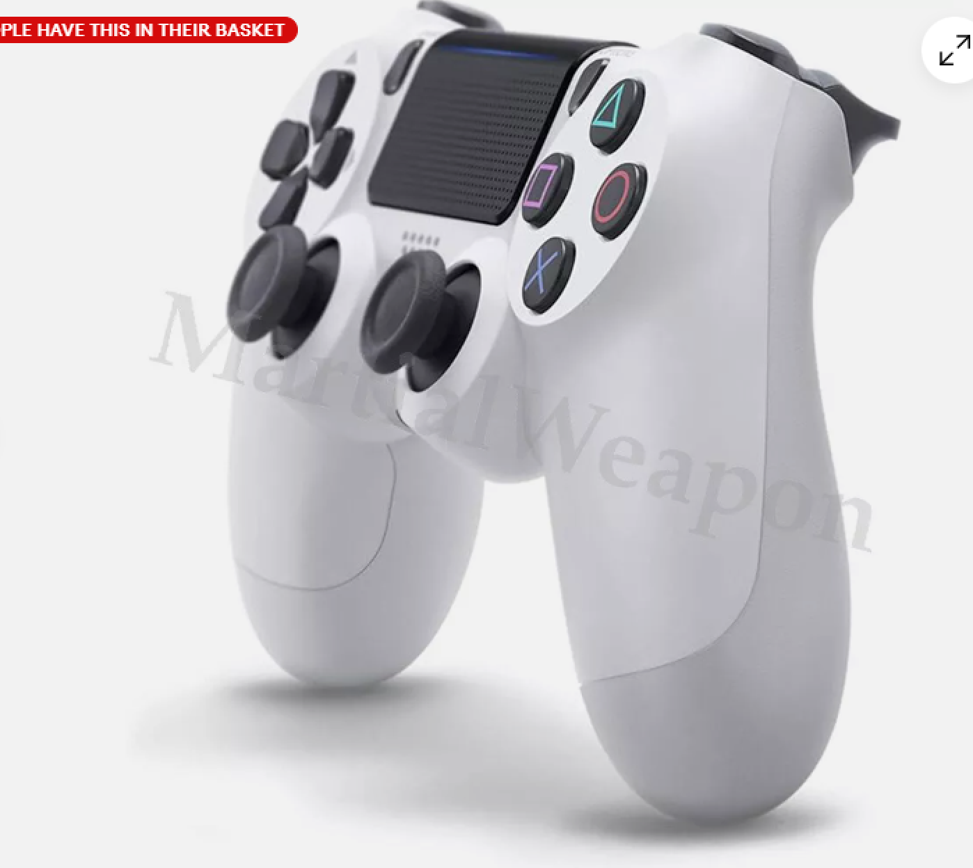 Ein weißer Controller mit schwarzen Joysticks und bunten Knöpfen.