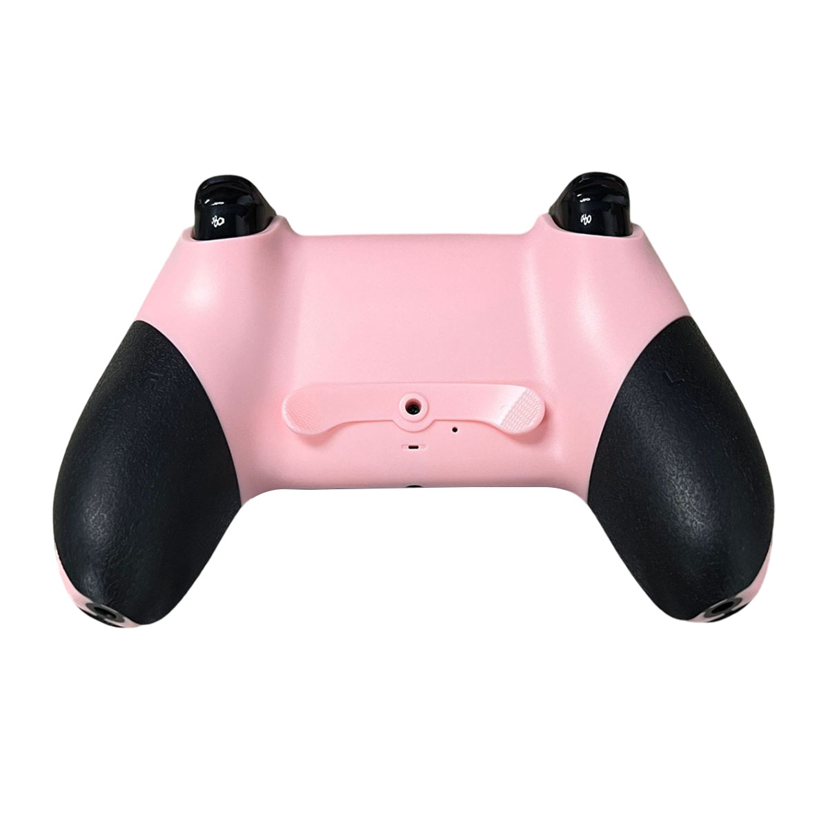 Ein pinker Controller mit schwarzen Griffen und schwarzen Sticks.