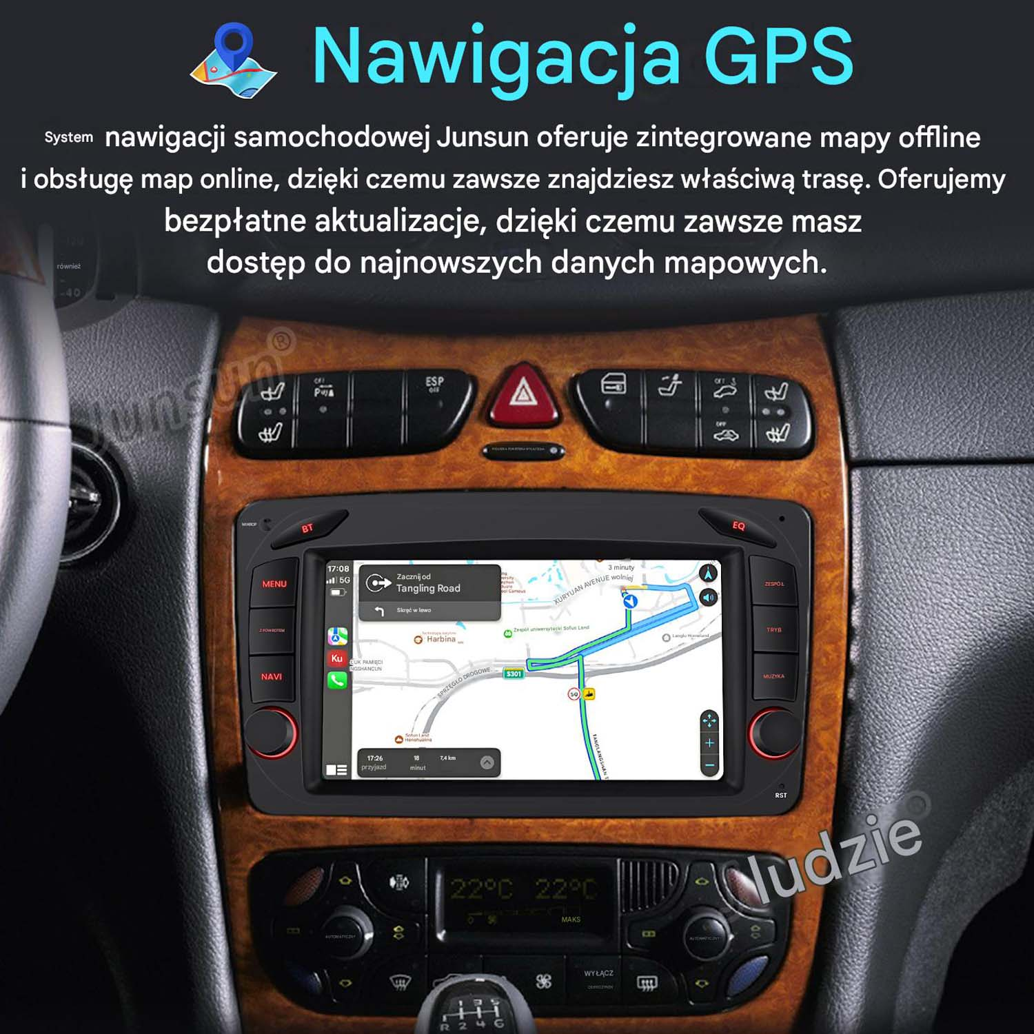 System nawigacji samochodowej z mapami i funkcją online na drewnianej desce rozdzielczej.