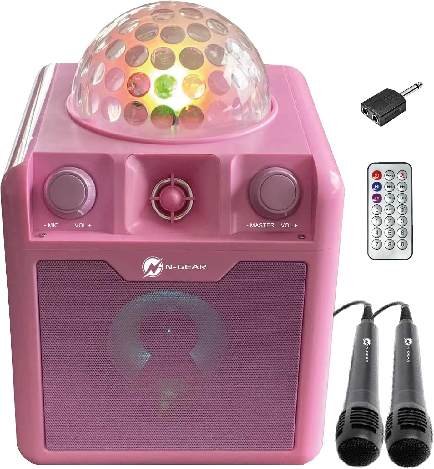 Un altoparlante rosa con sfera da discoteca, microfoni, telecomando e adattatore.
