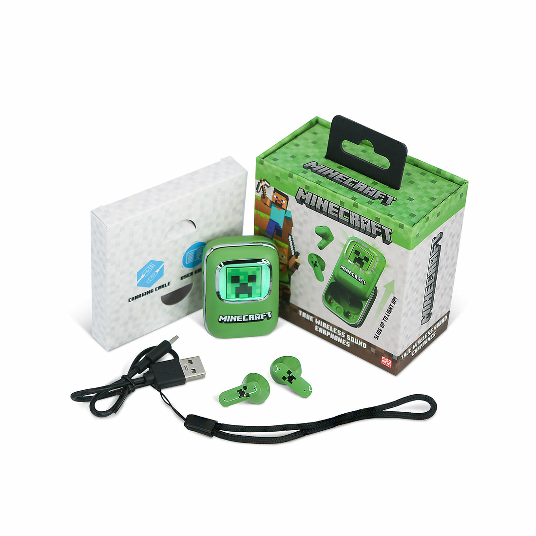 Groene Minecraft draadloze oordopjes, oplaadcase, kabel en doos op witte achtergrond.