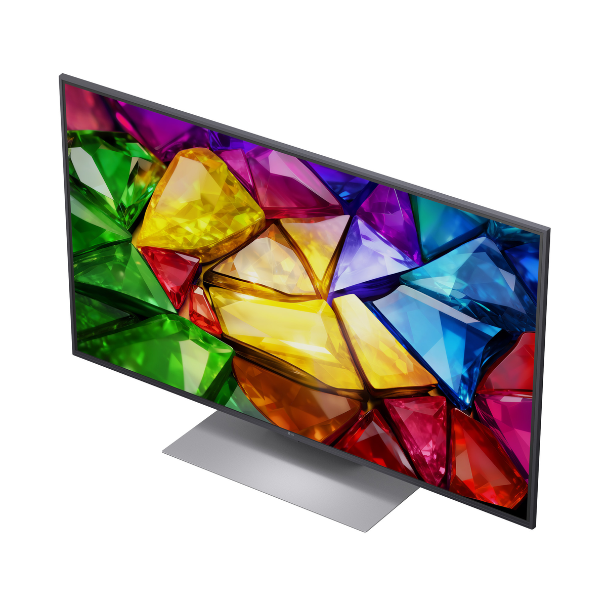 Un televisor moderno con un fondo de pantalla de gemas coloridas, con un soporte plateado en su base.