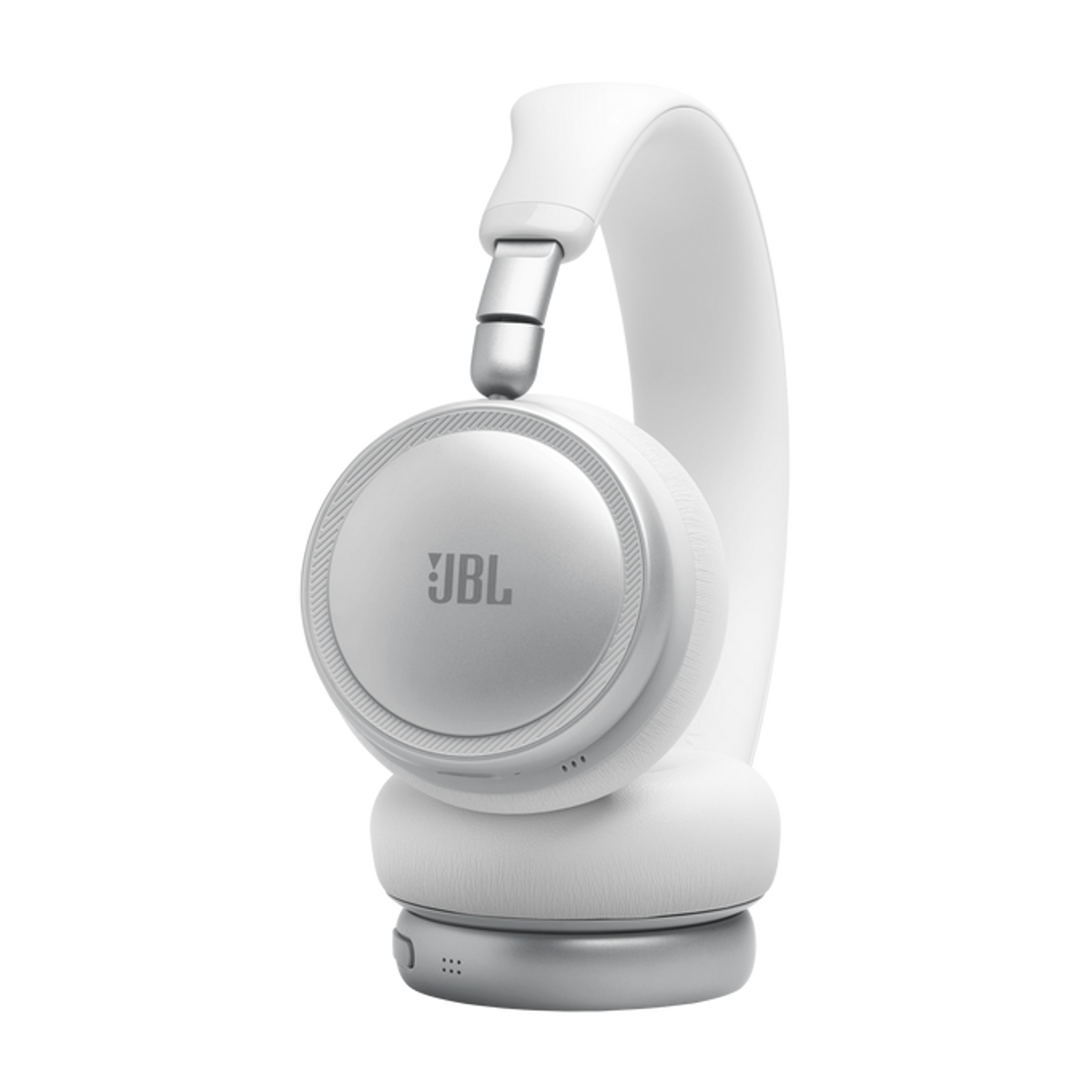 Cuffie JBL bianche con accenti argentati su sfondo nero.