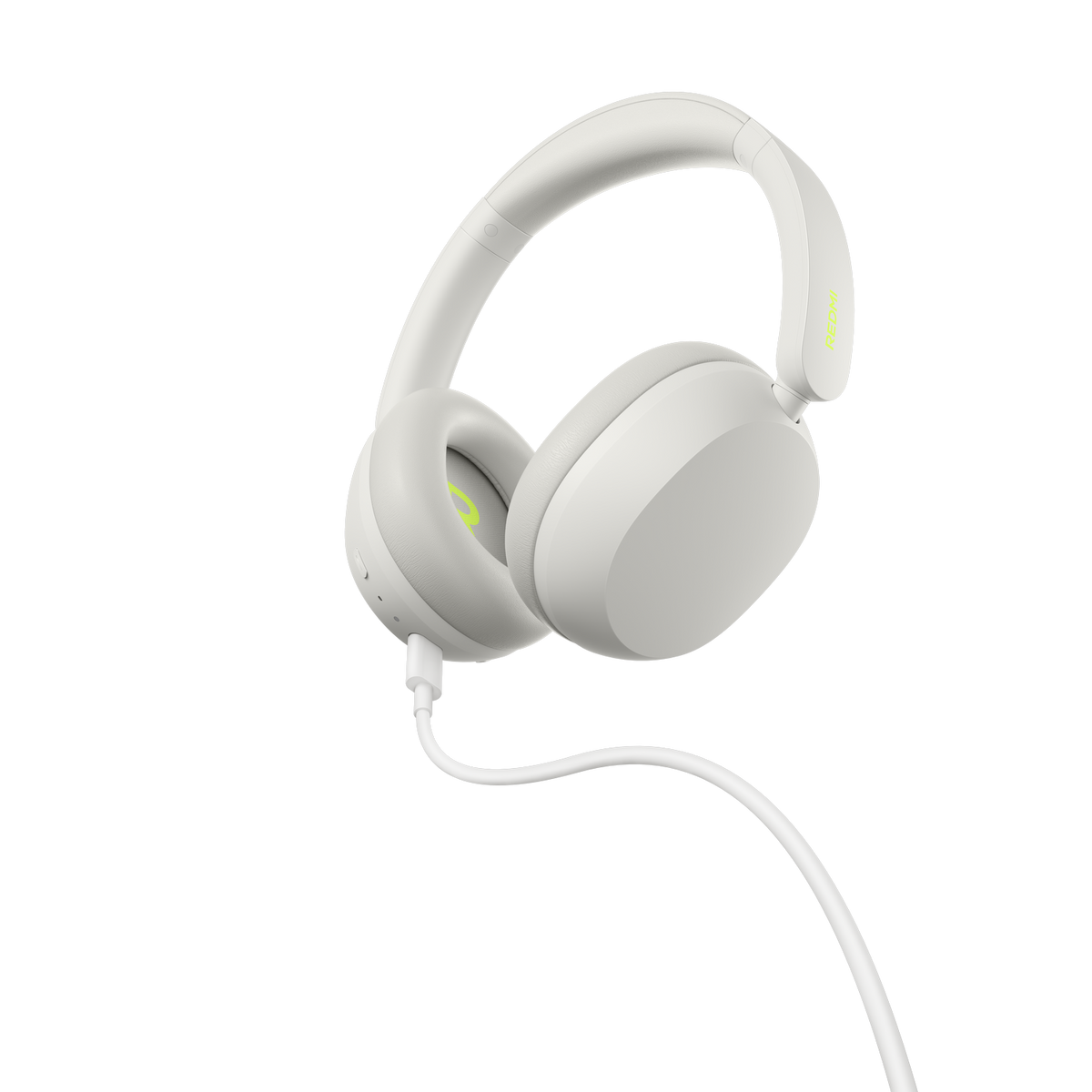 Auriculares blancos con detalles verde lima sobre fondo negro.