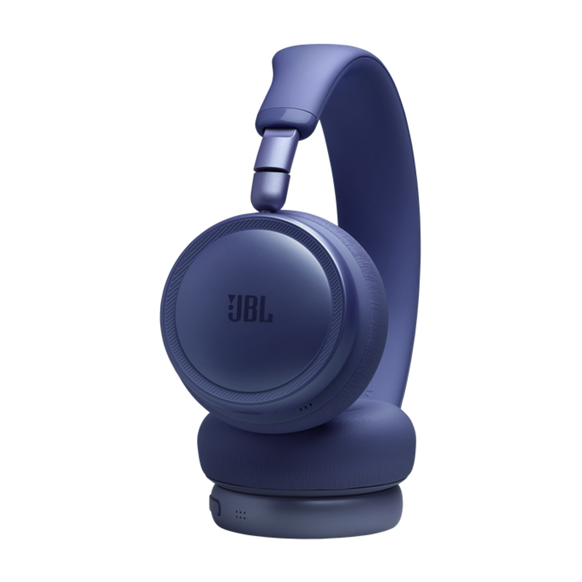 Primo piano di una cuffia JBL viola con logo visibile sul padiglione.