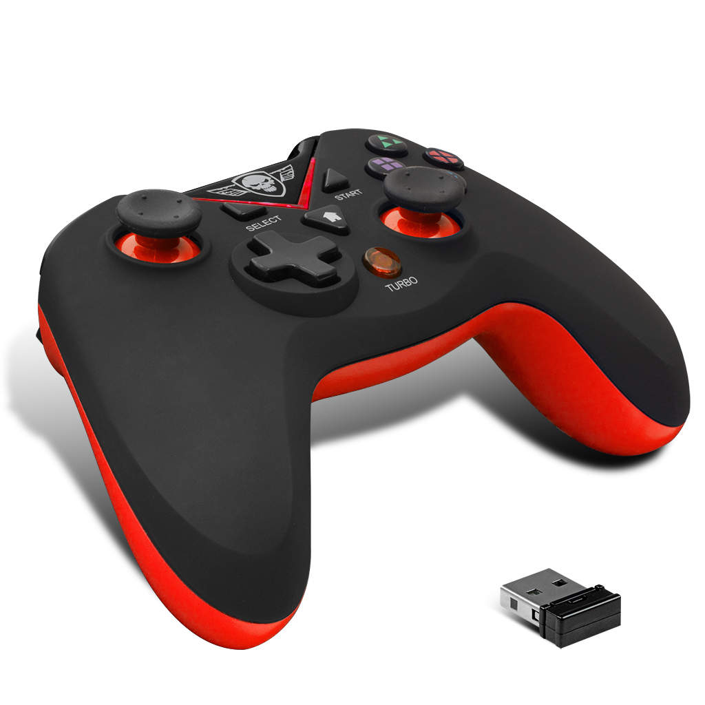 Un mando de videojuegos negro y rojo con un dongle USB al lado.