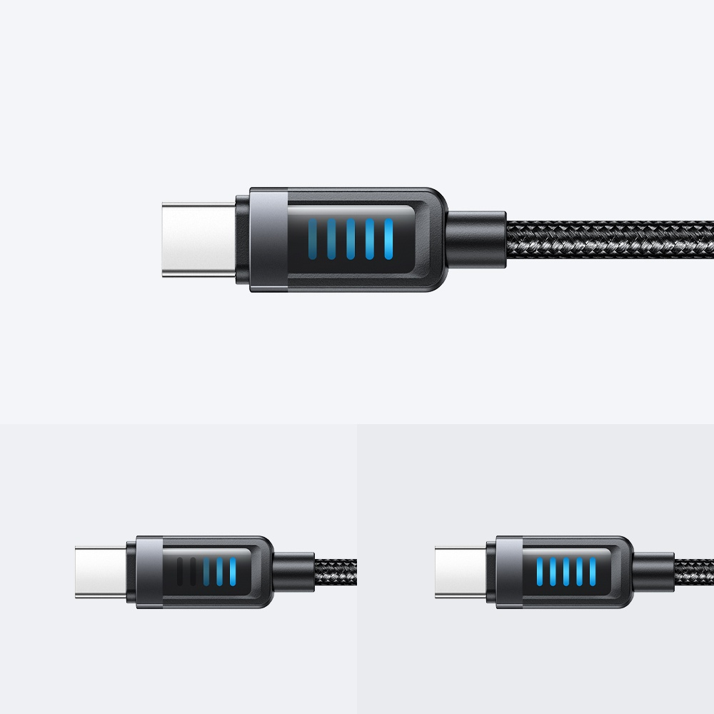 Mavi şarj göstergesi ve dokusu olan bir USB-C kablosu. Solda ve sağda başka bir kablo.