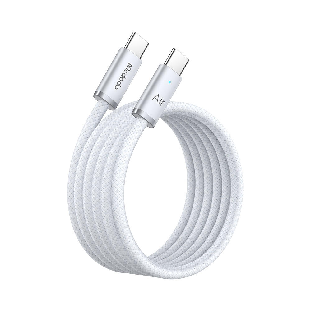 Gümüş konektörlü beyaz USB-C kablo, sarılı.