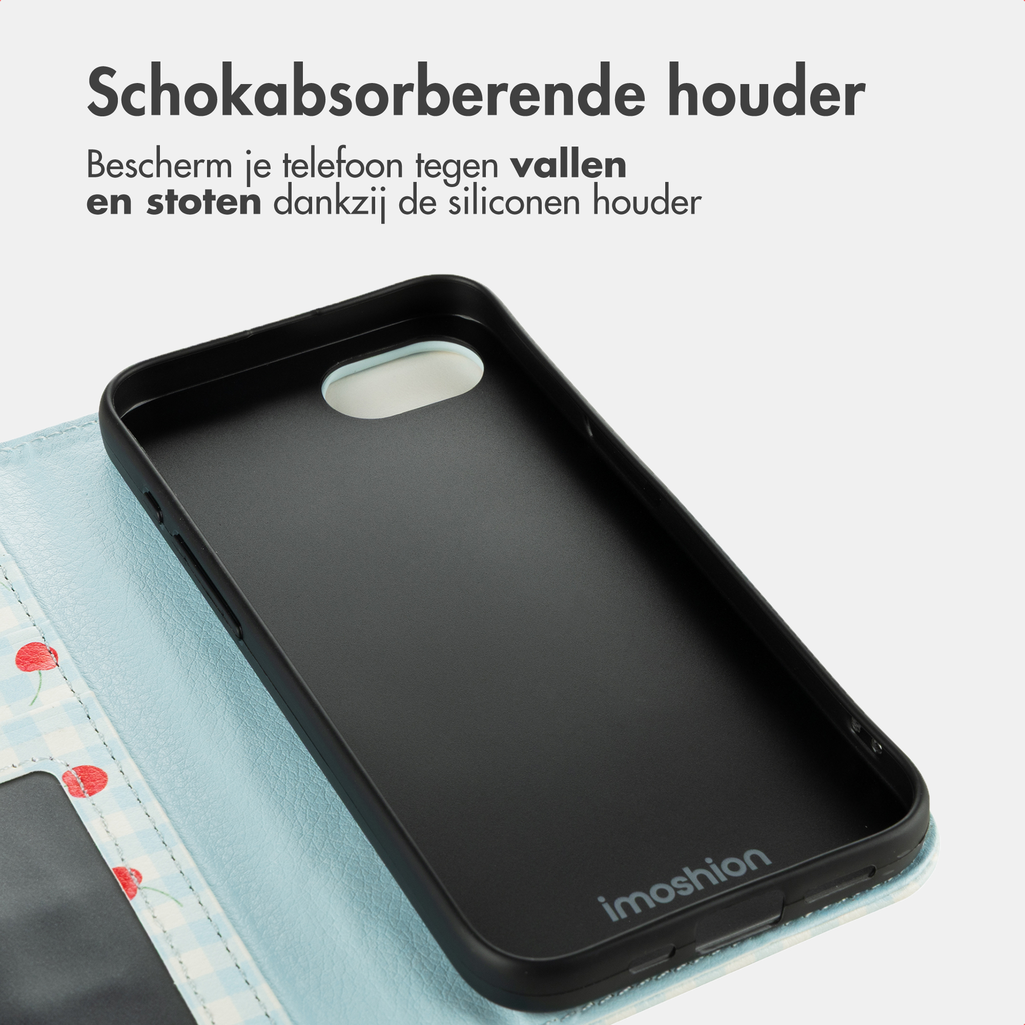 Black phone case with cherry pattern on a light blue checkered background.
